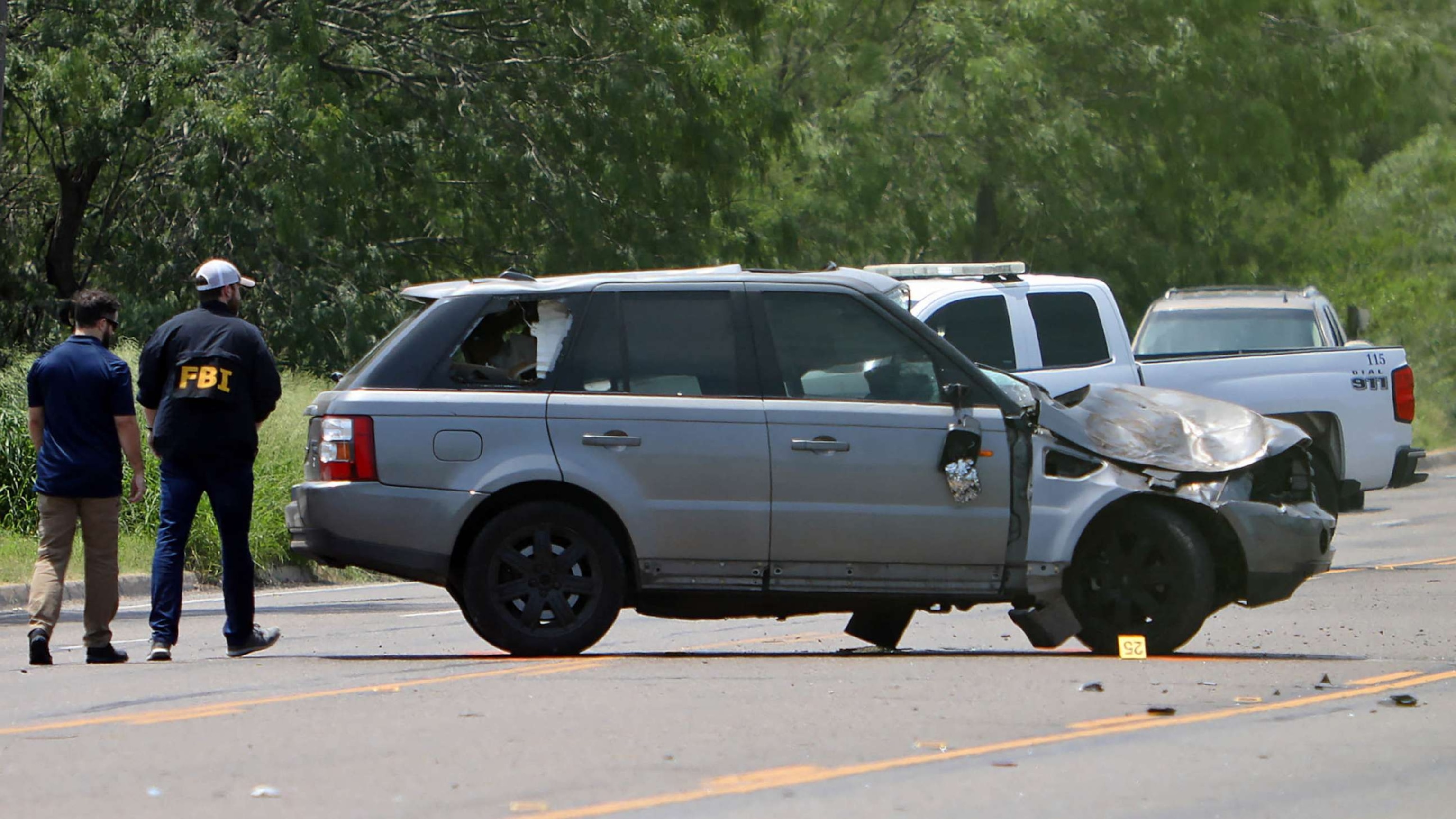 PHOTO: Law enforcement officers investigate the scene after a deadly incident where a car ran into pedestrians near Ozanam Center, a shelter for migrants and homeless, in Brownsville, Texas, May 7, 2023.