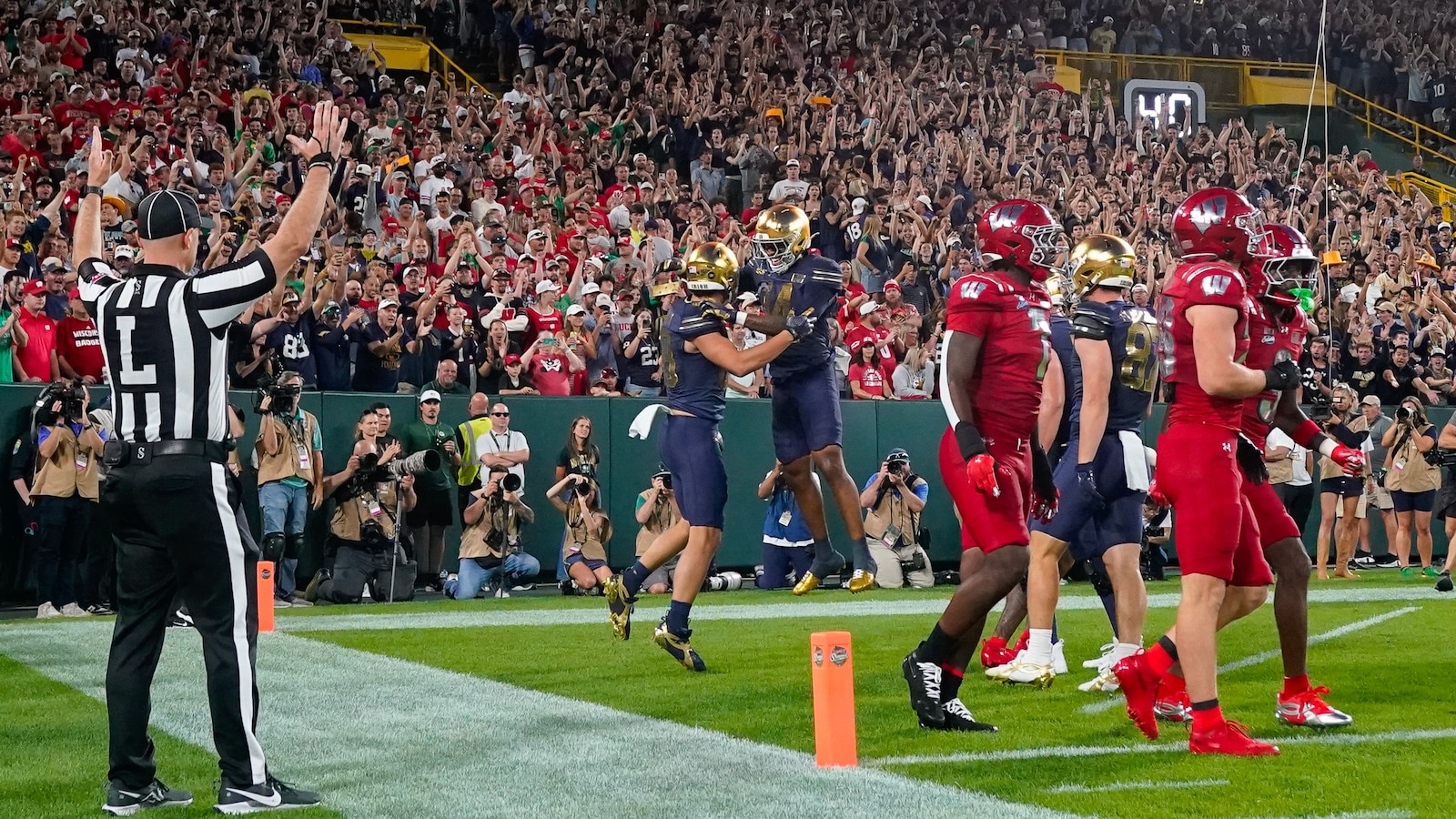 James Flanigan Scores First TD at Lambeau, Honoring Family Legacy