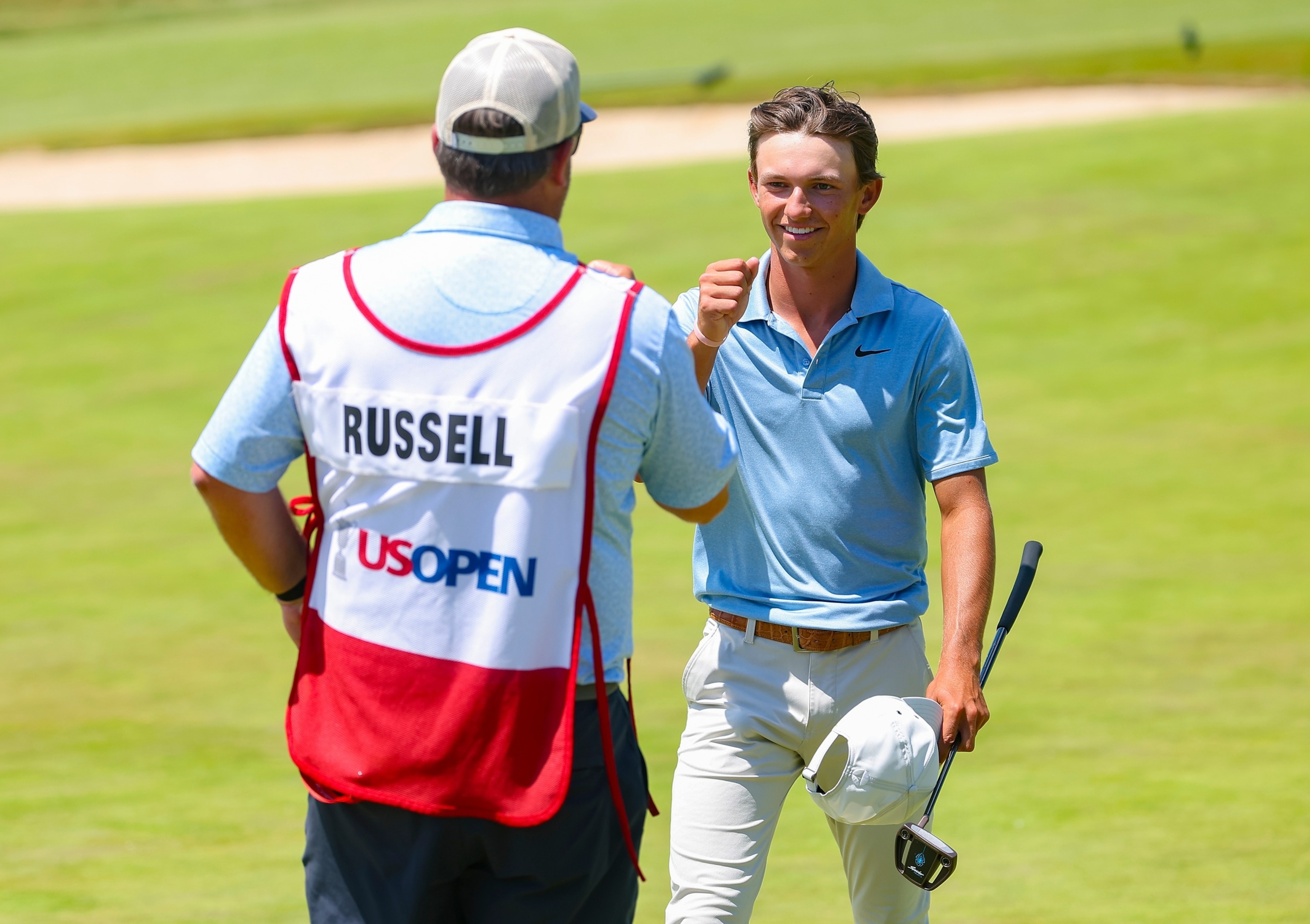 PHOTO: Cap: No. 1 ranked junior golfer in the world Miles Russell asked his dad, Joe Russell, to caddie for his final hole at the 126th U.S. Open on Sunday, June 21.
