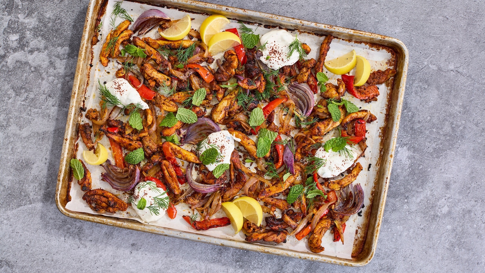 A sheet pan of chicken shawarma.