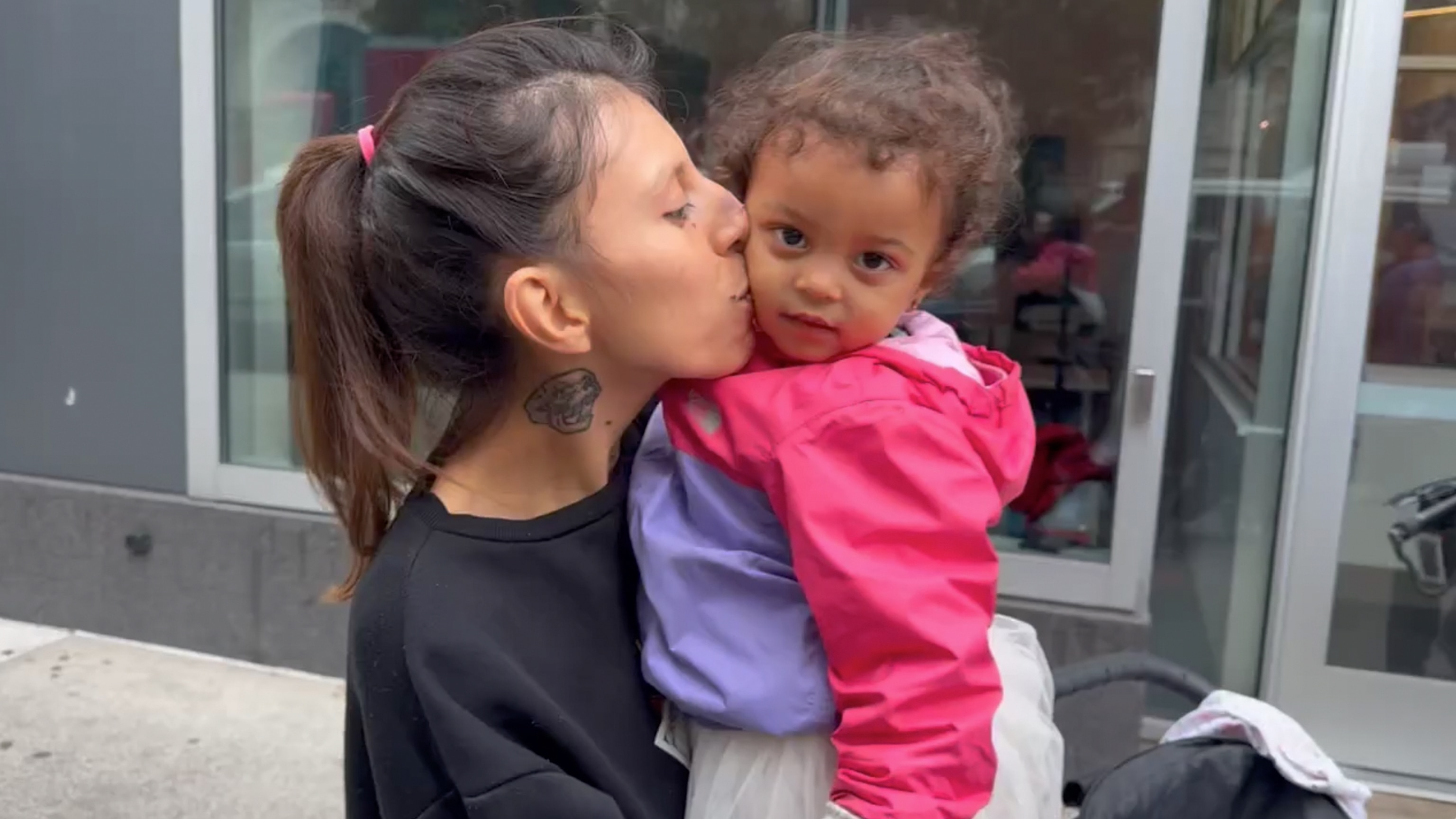 PHOTO: Catherine, a first time WIC participant, is pictured with her daughter Sofia outside the WIC center at Ryan Health in New York City.