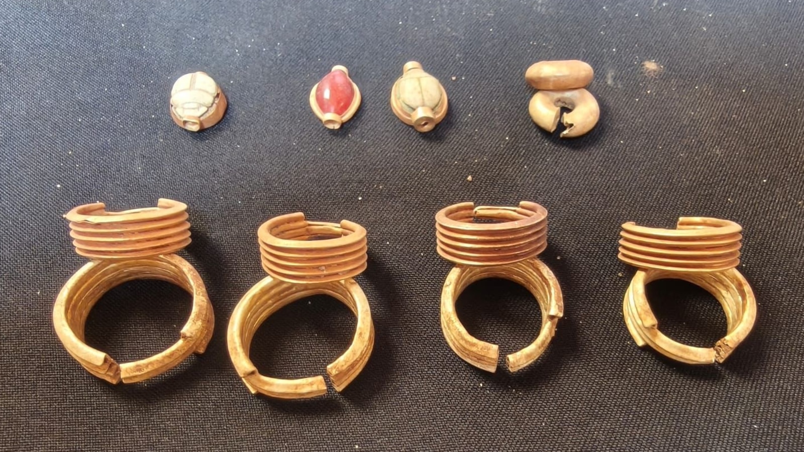 Egypt unveils a striking trove of ancient artifacts as the country tries to boost tourism industry
