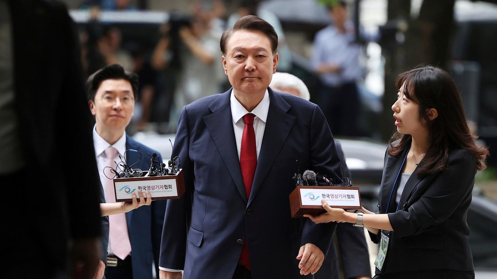 South Korea`s jailed ex-leader Yoon resists questioning by taking off prison uniform