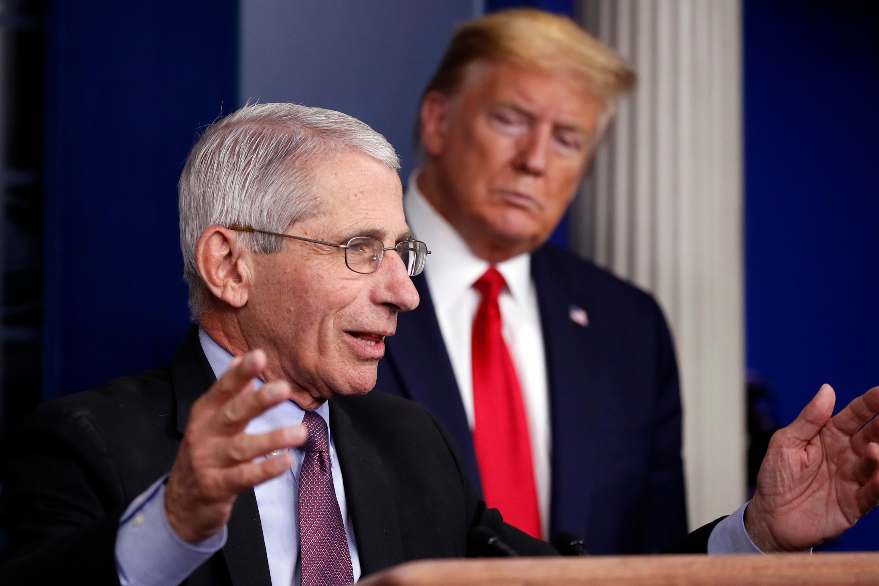 PHOTO: In this April 22, 2020, photo President Donald Trump watches as Dr. Anthony Fauci, director of the National Institute of Allergy and Infectious Diseases, speaks about the coronavirus at the White House in Washington, D.C.