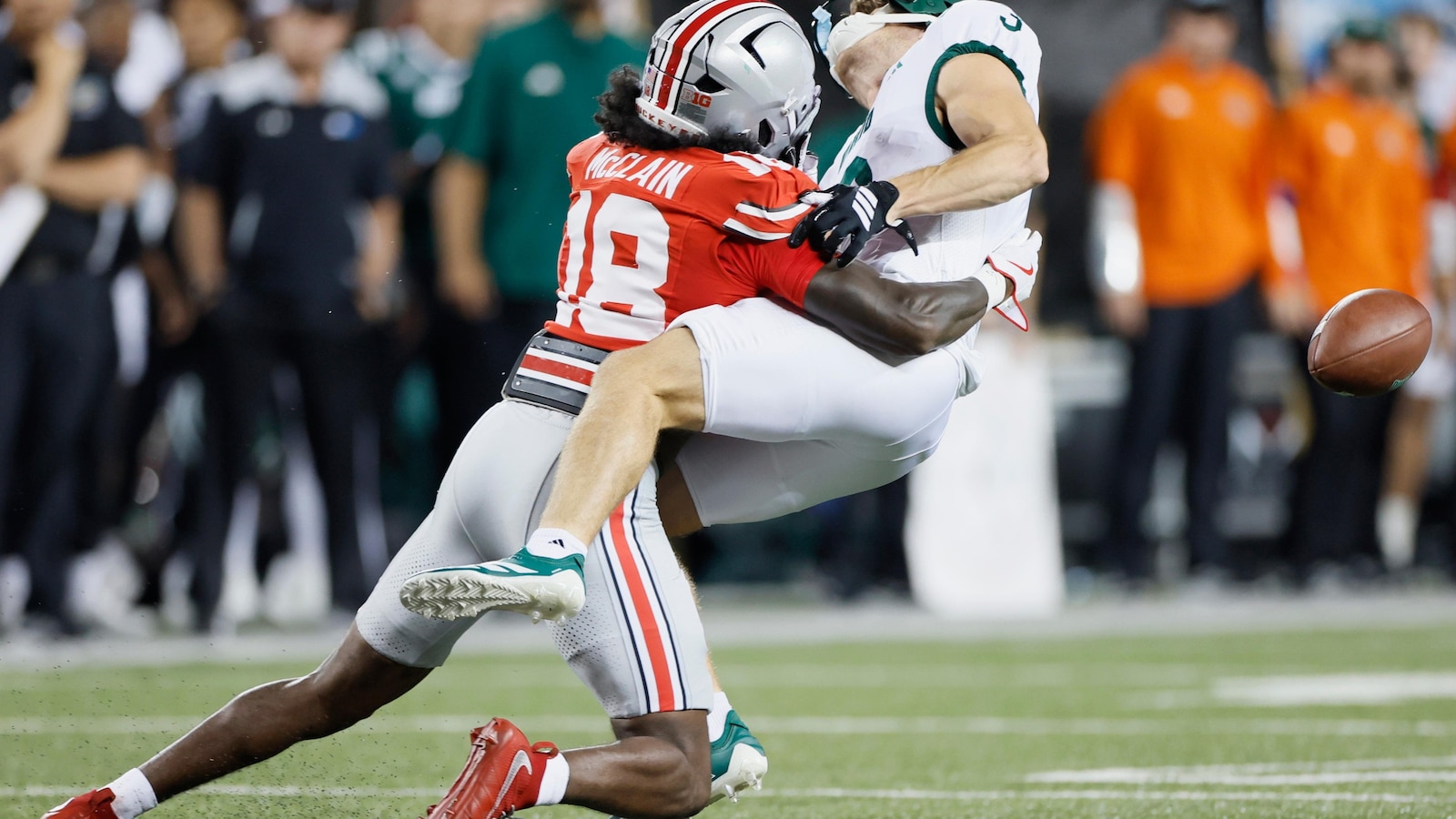 Sayin passes for 3 touchdowns, top-ranked Ohio State pulls away in second half to defeat Ohio 37-9