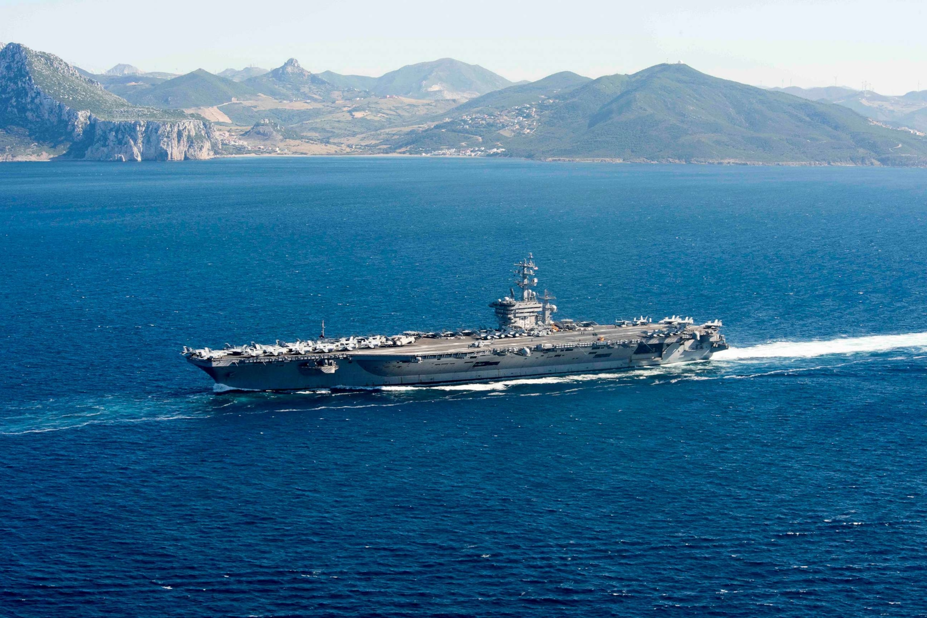 PHOTO: In this June 13, 2016, file photo provided by the U.S. Navy, the aircraft carrier USS Dwight D. Eisenhower transits the Strait of Gibraltar into the Mediterranean Sea.