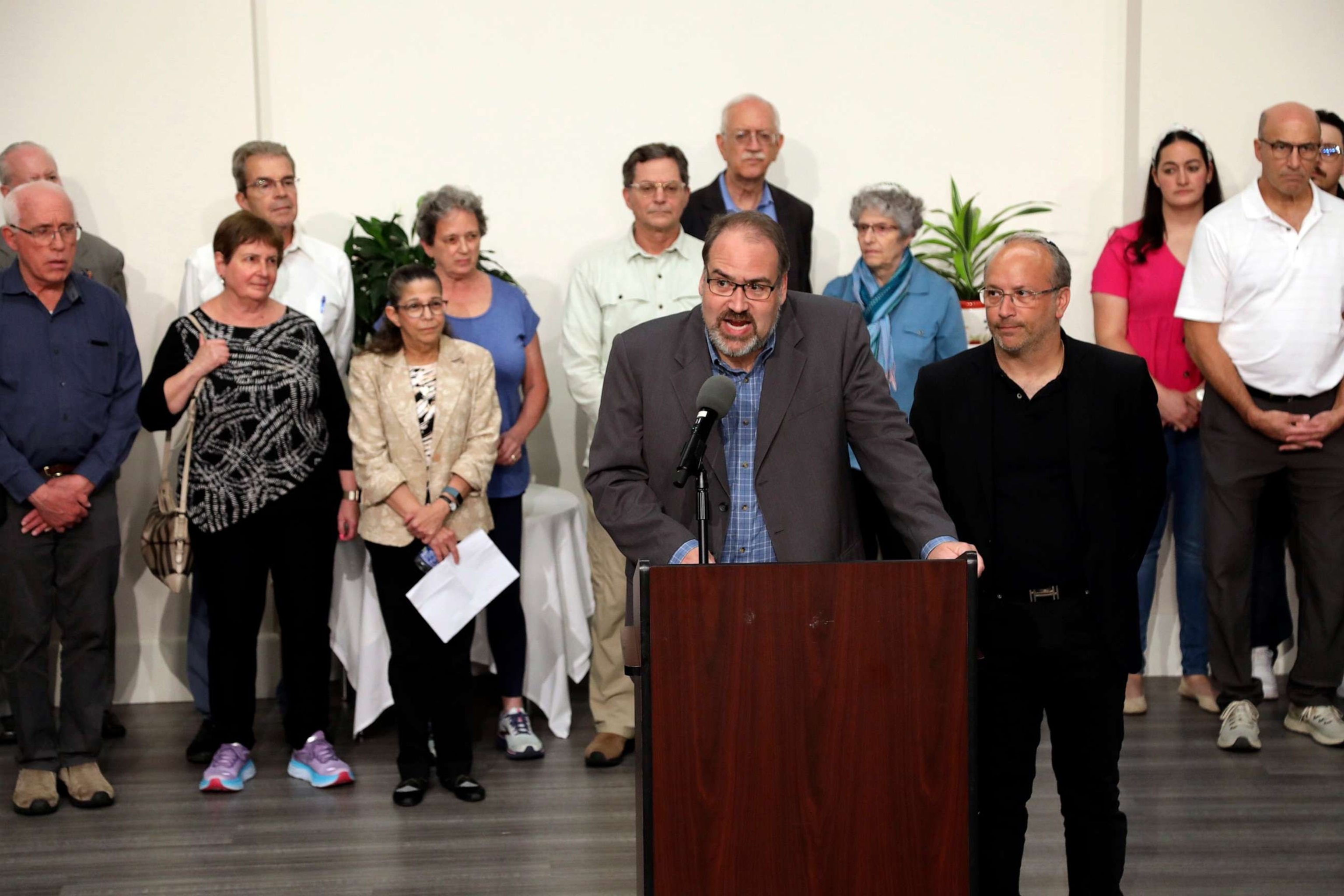 PHOTO: Howard Fienberg speaks to the media surrounded by victims and families of victims following the sentencing of Robert Bowers at the Jewish Community Center in Pittsburgh, Aug 2, 2023.