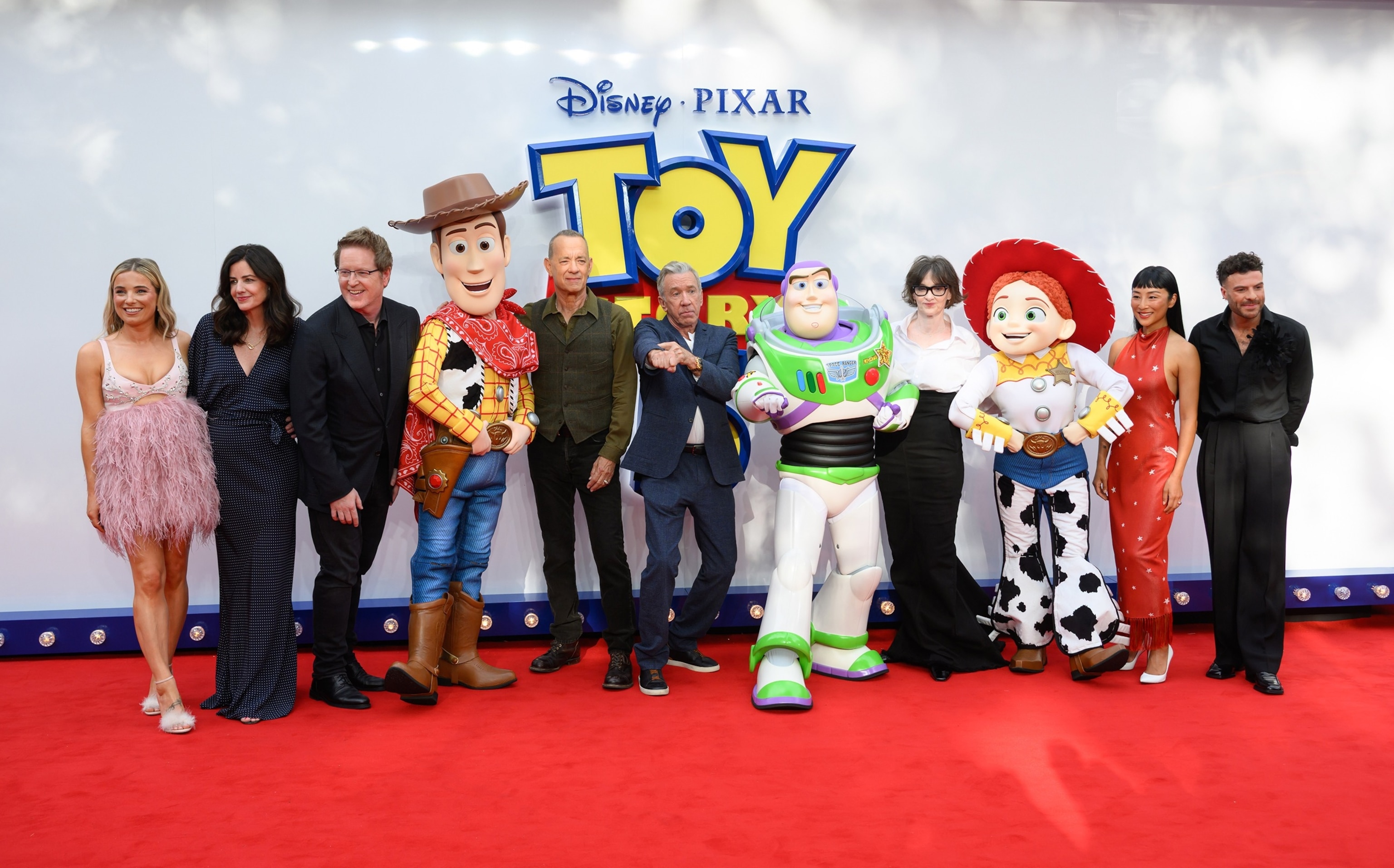 PHOTO: Sian Welby, Lindsey Collins, Andrew Stanton, 'Woody', Tom Hanks, Tim Allen, 'Buzz Lightyear', Joan Cusack, 'Jessie', Greta Lee and Jordan North attend the "Toy Story 5" UK launch event at Odeon Luxe Leicester Square on May 28, 2026.  