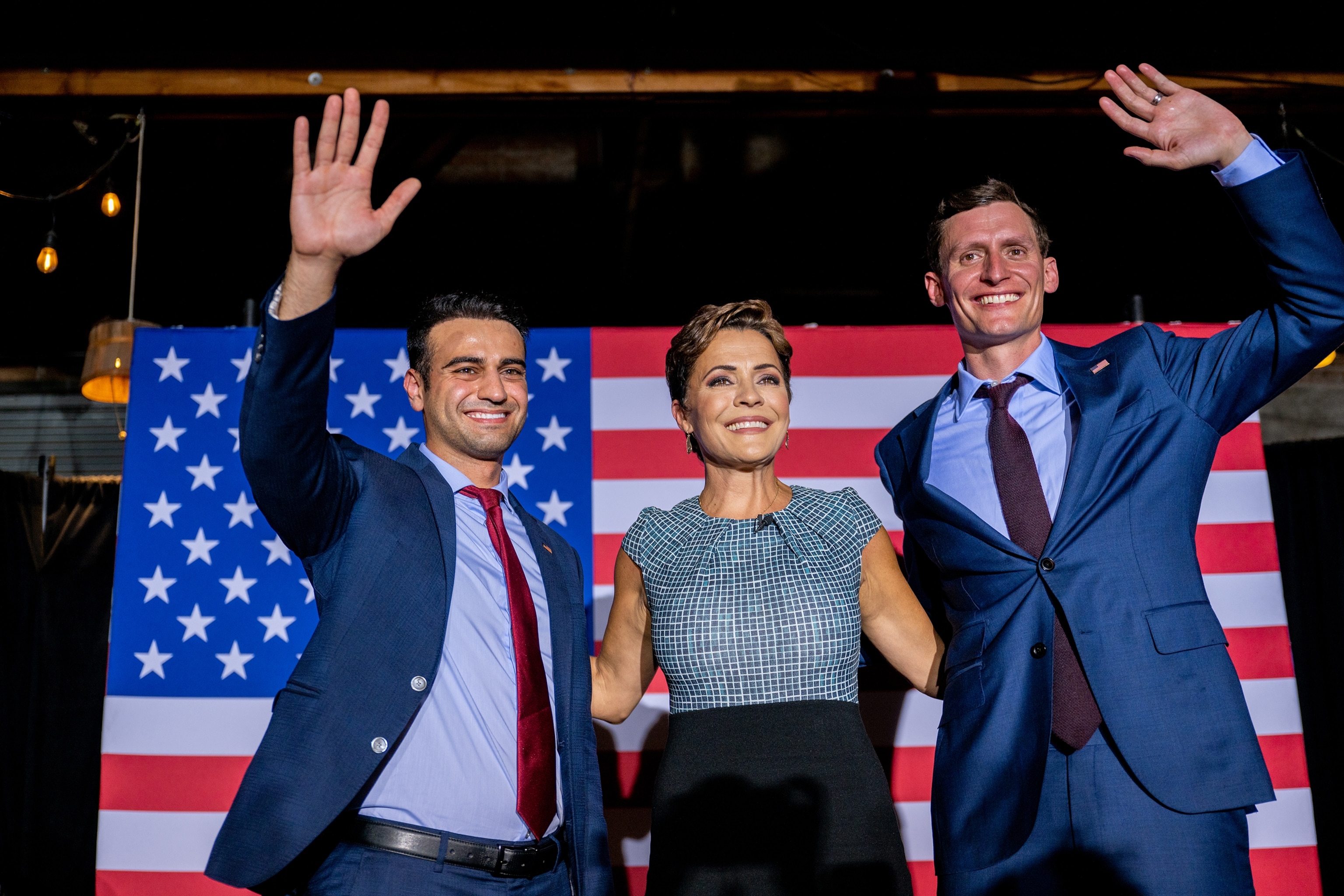 PHOTO: In this Aug. 1, 2022, file photo, Republican candidate for state attorney general Abraham Hamadeh, Republican gubernatorial candidate Kari Lake, and Republican U.S. senatorial candidate Blake Masters wave at an event in Phoenix, Ariz.