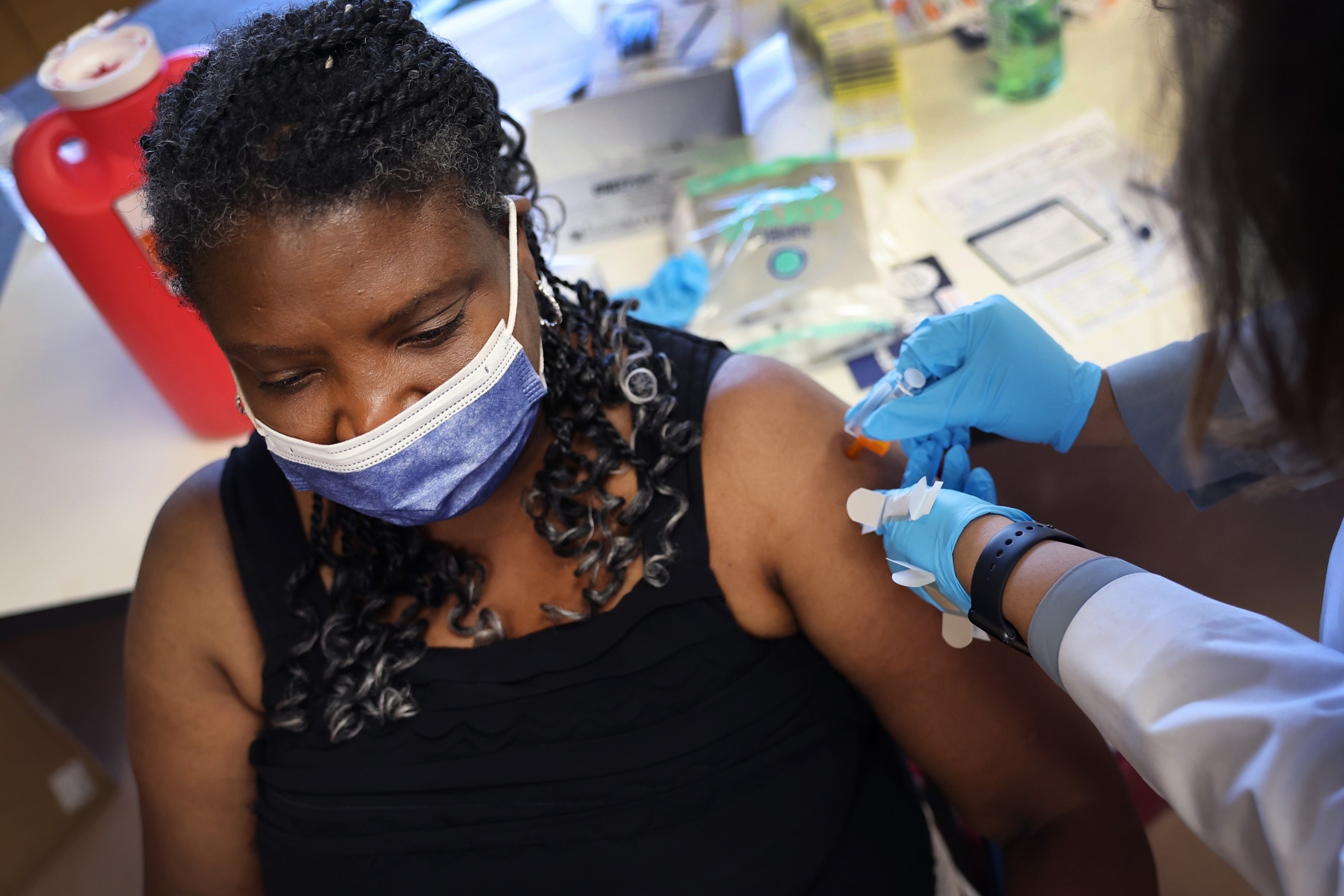 PHOTO: Margaret LaRaviere gets an  influenza vaccine during an event hosted by the Chicago Department of Public Health at the Southwest Senior Center on September 09, 2022 in Chicago, Illinois.
