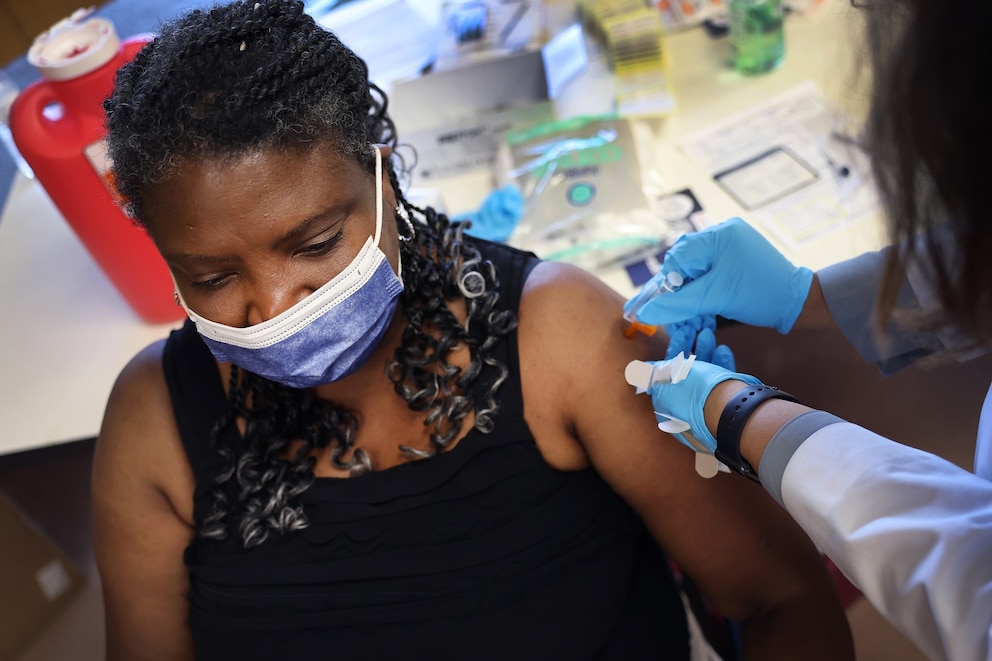 PHOTO: Margaret LaRaviere gets an  influenza vaccine during an event hosted by the Chicago Department of Public Health at the Southwest Senior Center on September 09, 2022 in Chicago, Illinois.