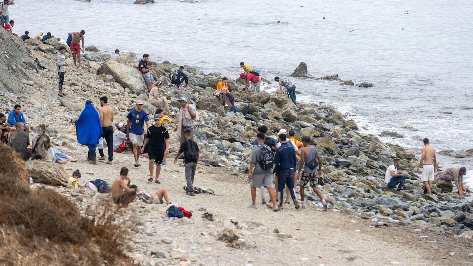 60,000 cross into Spanish territory of Ceuta and at least 34 die after border breach
