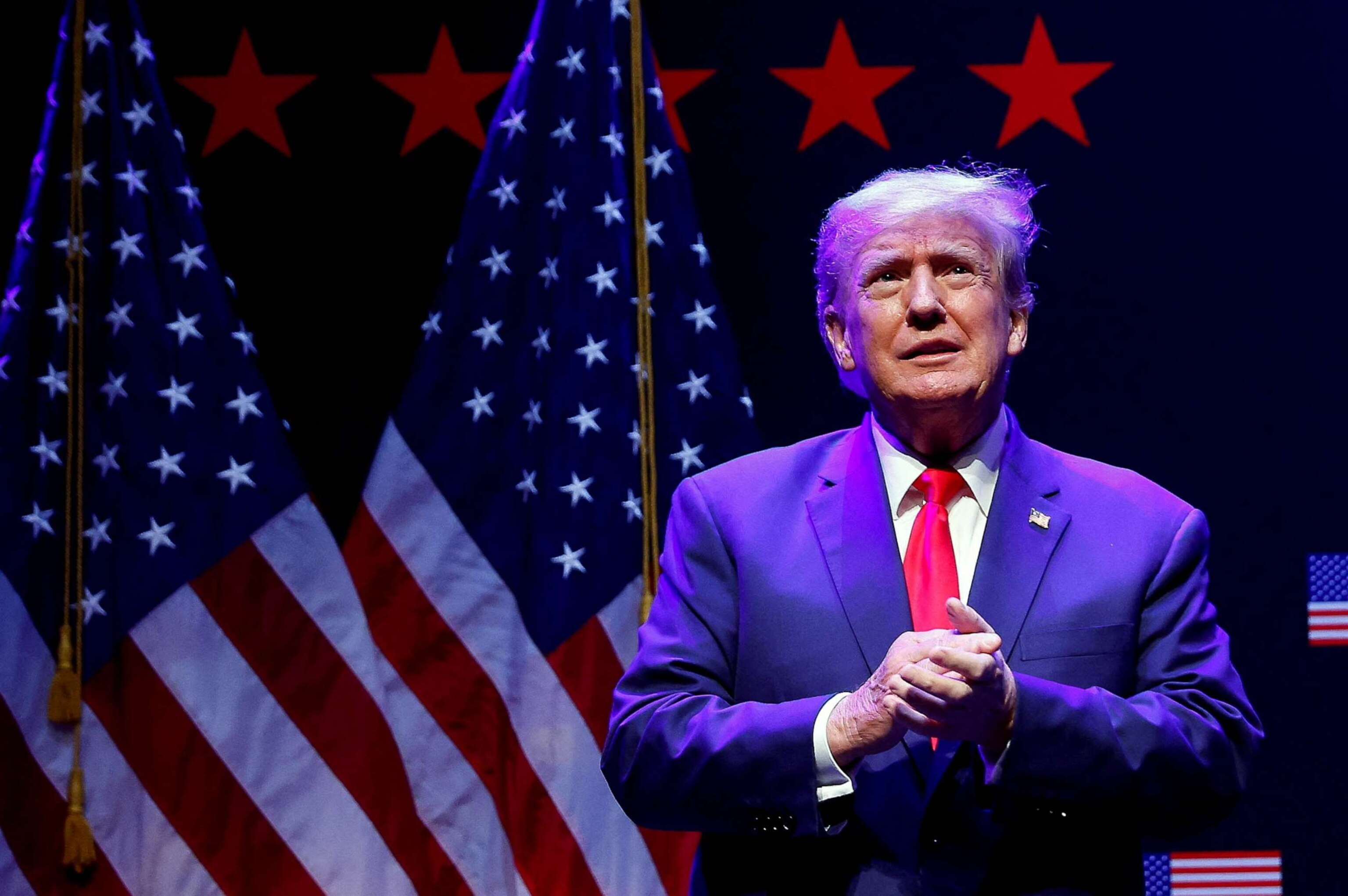 PHOTO: FILE - Former President Donald Trump takes the stage to deliver remarks in Davenport, Iowa, March 13, 2023.