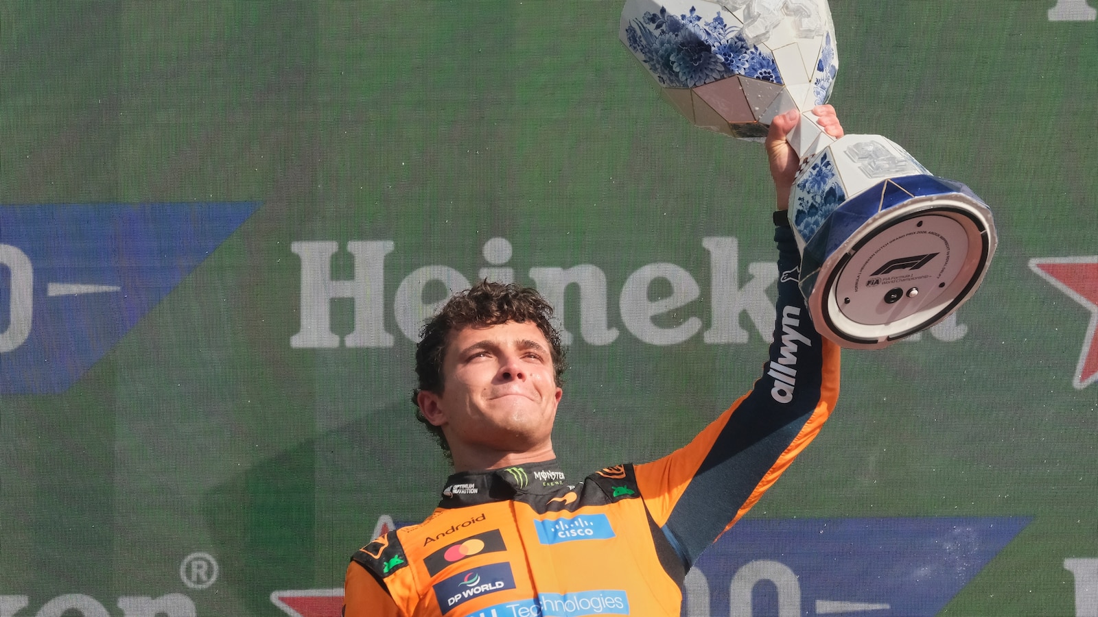 Lando Norris wins F1's Dutch Grand Prix after a daring pass on Kimi ...