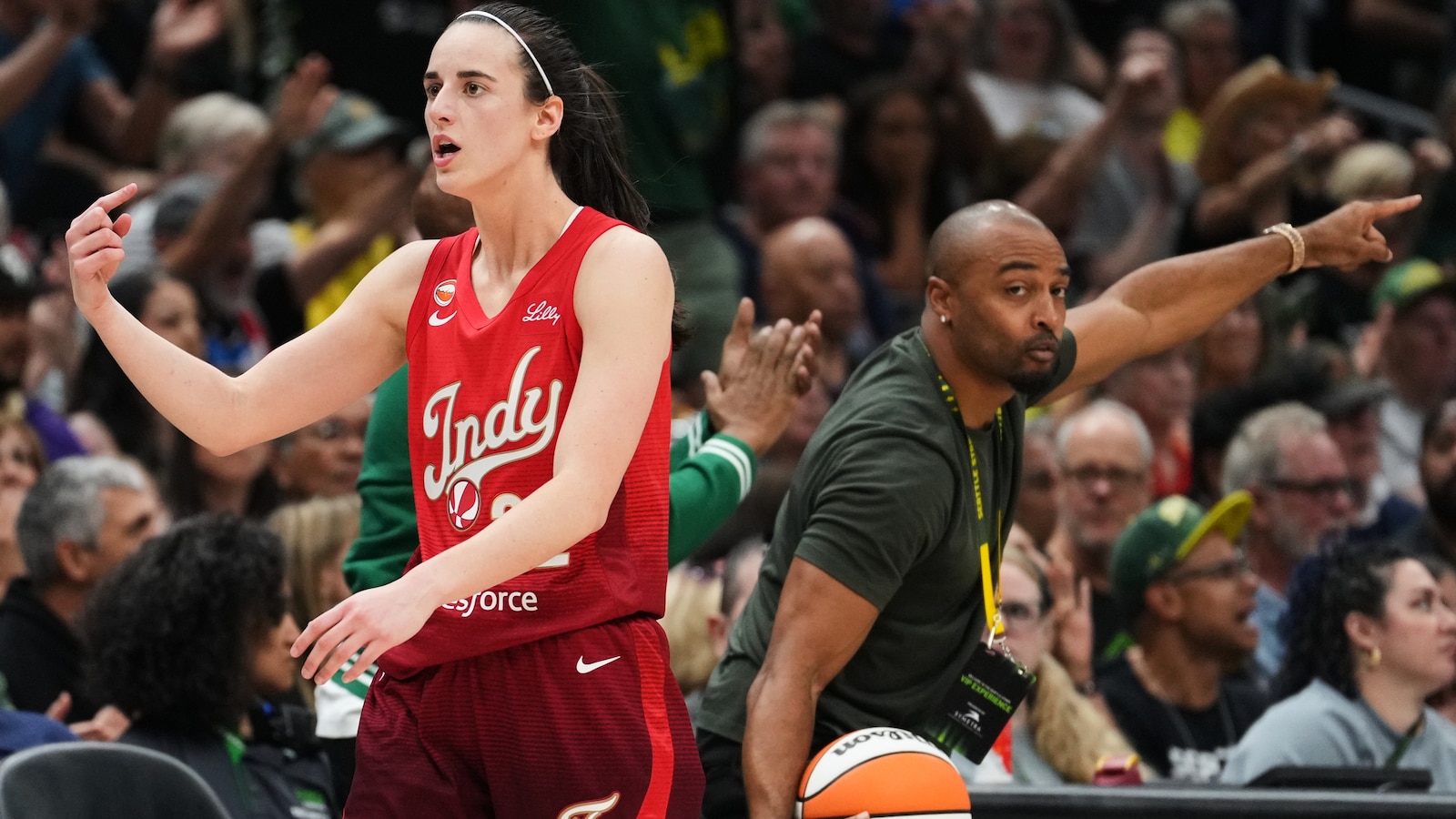 Clark and Mitchell lead Fever to their 4th straight victory, 105-95 over the Storm