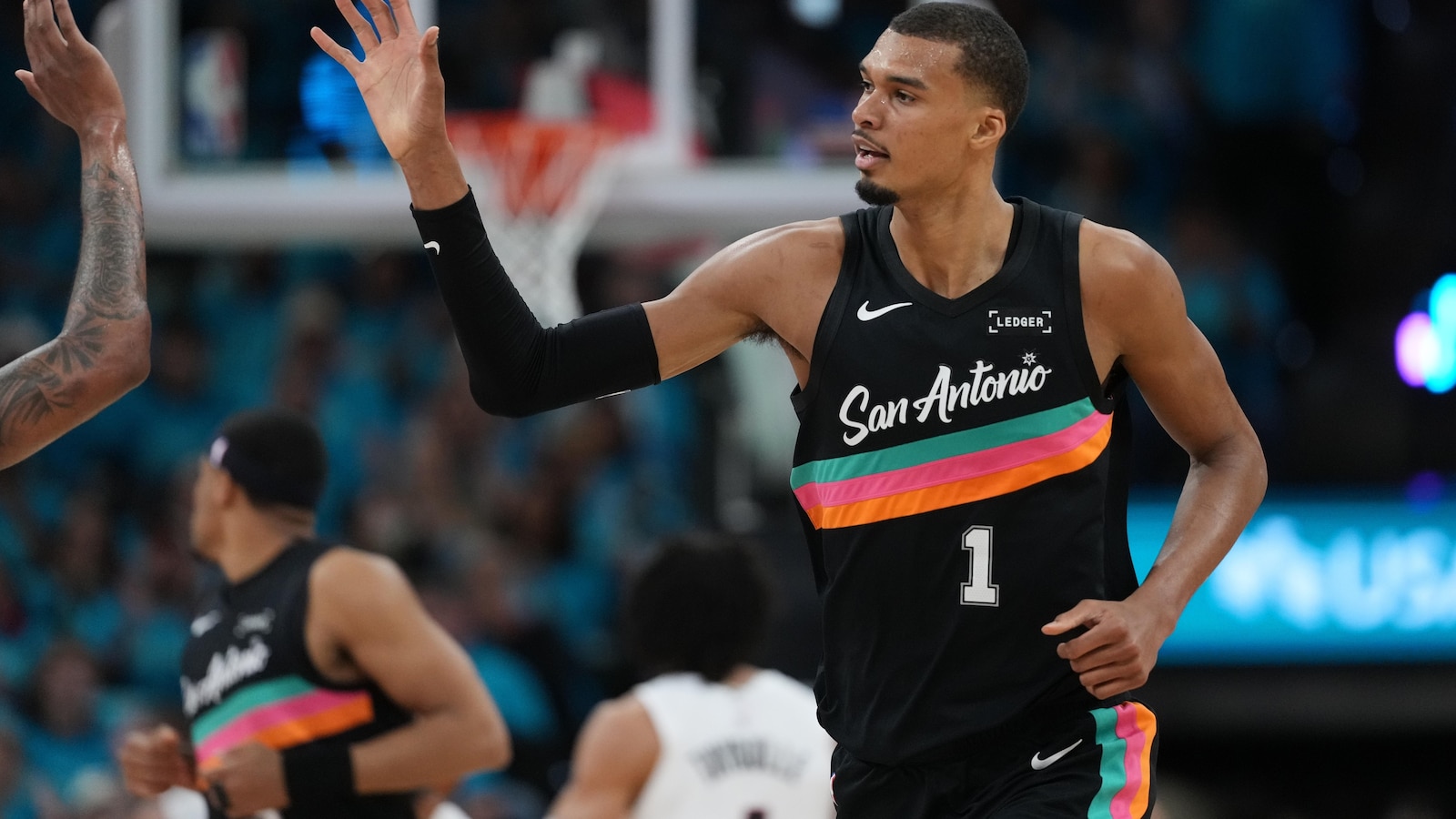 Wembanyama scores 35 points in playoff debut as Spurs roll past Trail Blazers 111-98