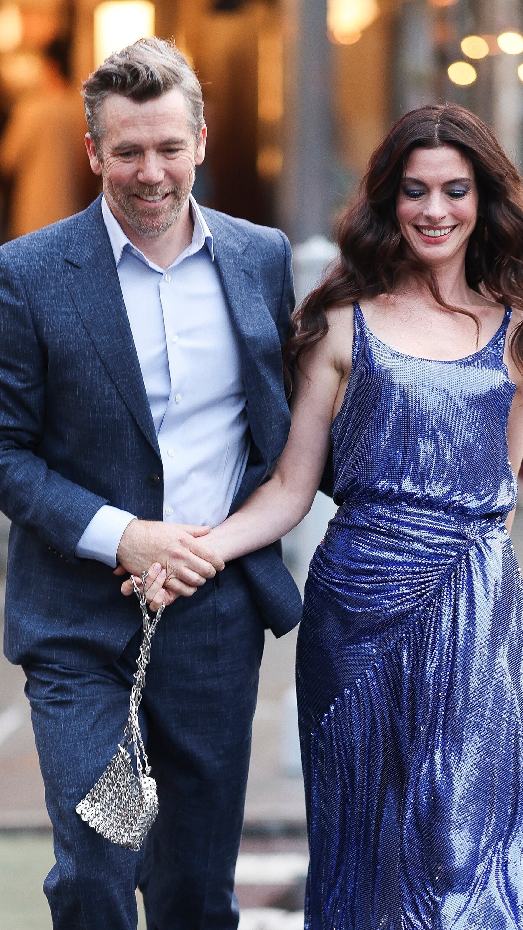 Anne Hathaway is all smiles on 'Devil Wears Prada 2' set with