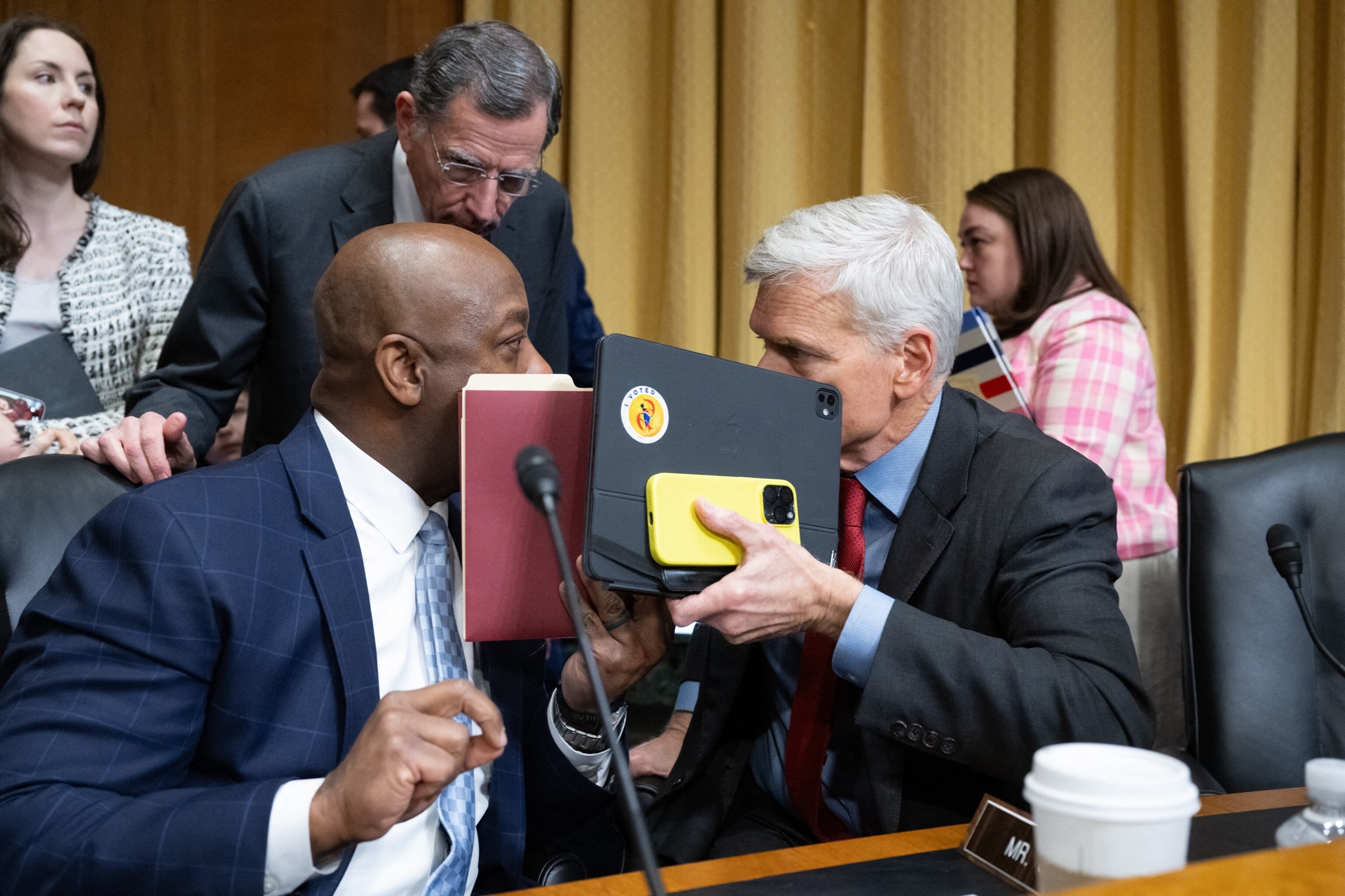 PHOTO: Senator Cassidy, (R-La.) and Senator Scott, (R-S.C.) speak during a Senate Finance Committee business meeting after voting to advance the nomination of Robert F. Kennedy Jr. to be Secretary of Health and Human Services in Washington, Feb. 4, 2025.