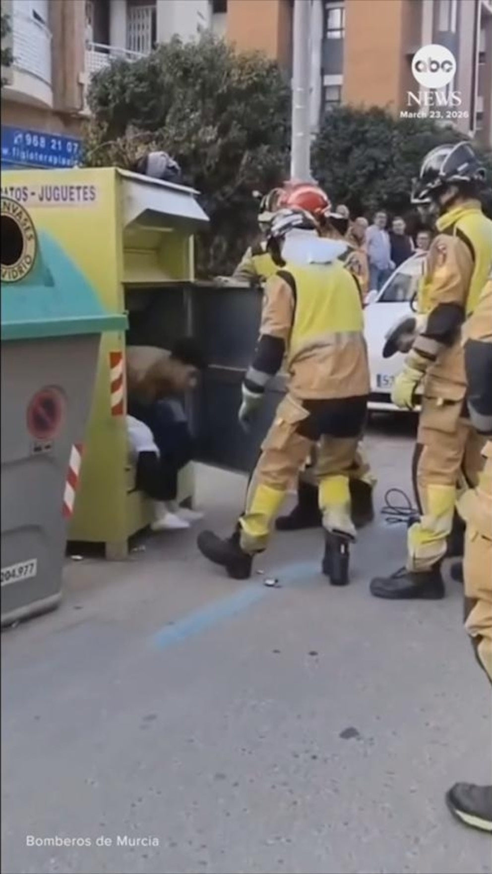Video Firefighters rescue man who got stuck in clothing donation box