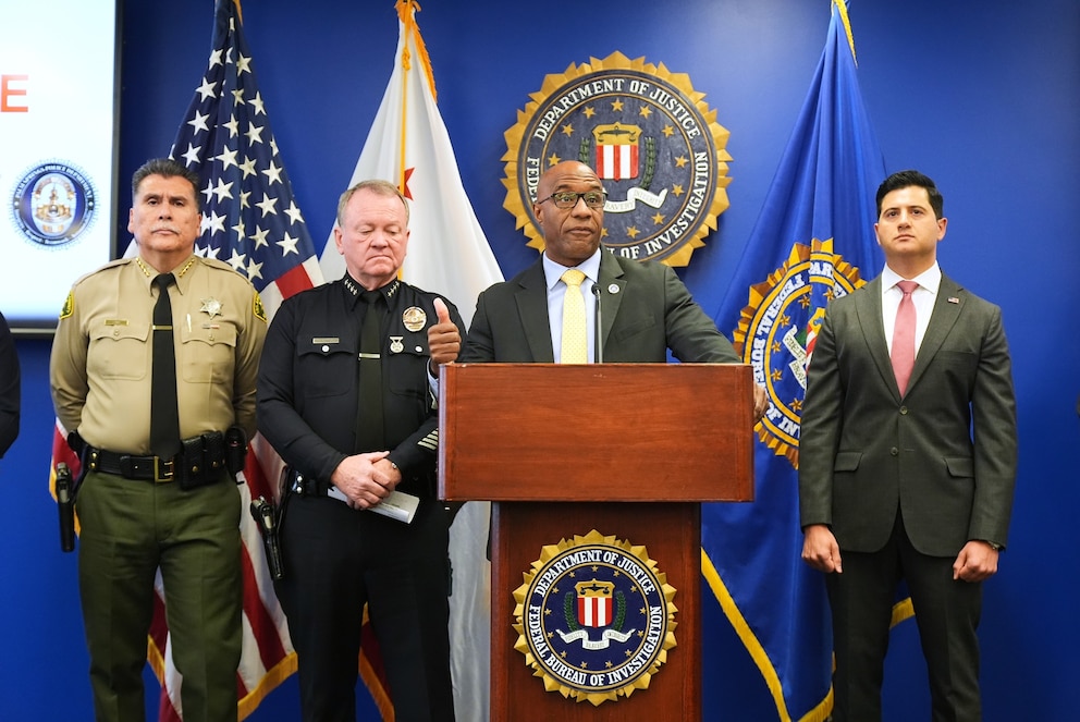 PHOTO: FBI Assistant Director in Charge Akil Davis and First Assistant United States Attorney Bill Essayli while announcing developments on a terrorism investigation during a press conference, Dec. 15, 2025, in Los Angeles.