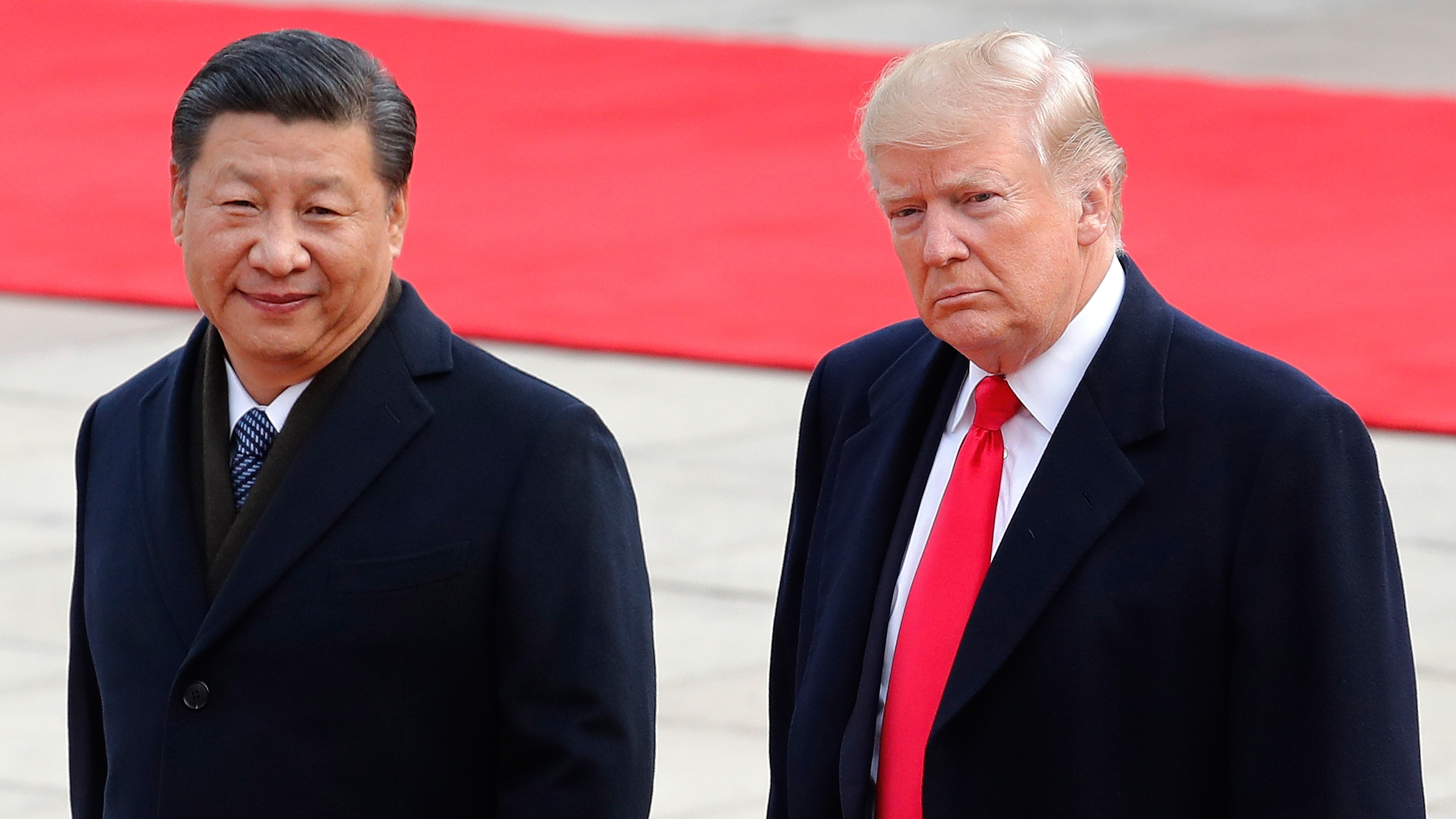 Chinese President Xi Jinping arrives at Joint Base Andrews for a three-day state visit, greeted on the tarmac by President Trump