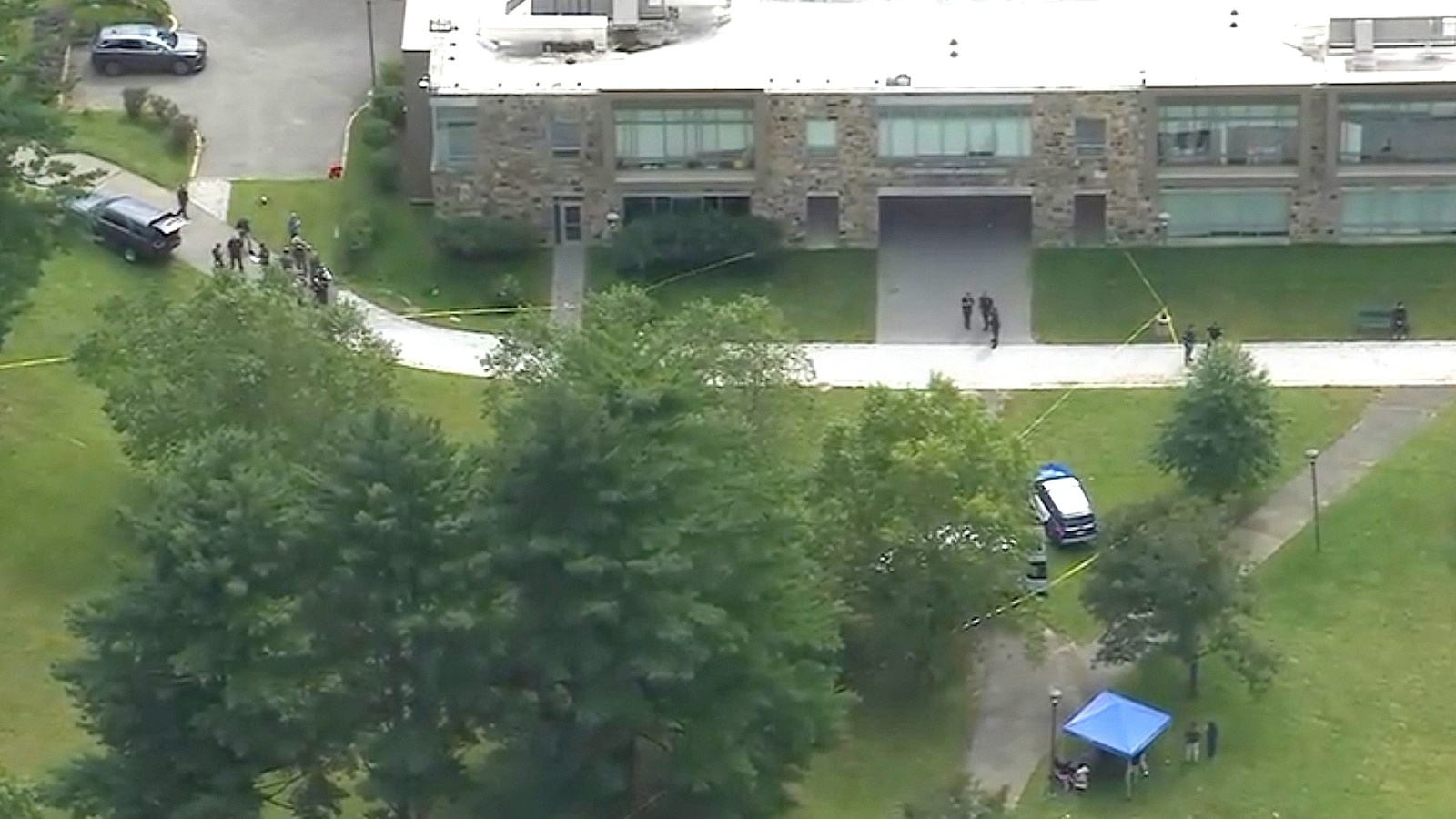 Three people were injured in a stabbing at a community college in New York on Wednesday, authorities said.