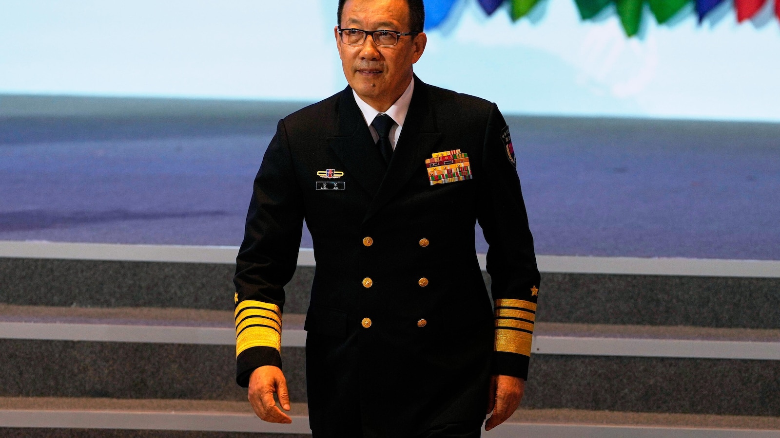 China's defense minister renews threats to take over Taiwan at security forum
