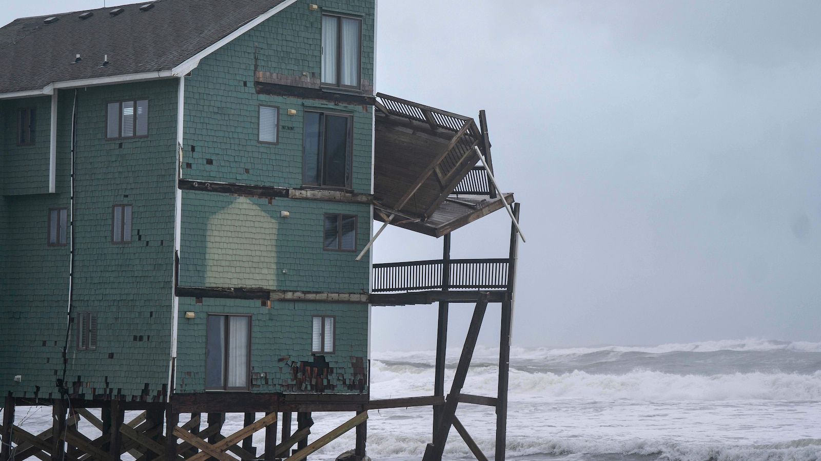 Dozens rescued as typhoon remnants hit Alaska; nor'easter brings floods to East Coast