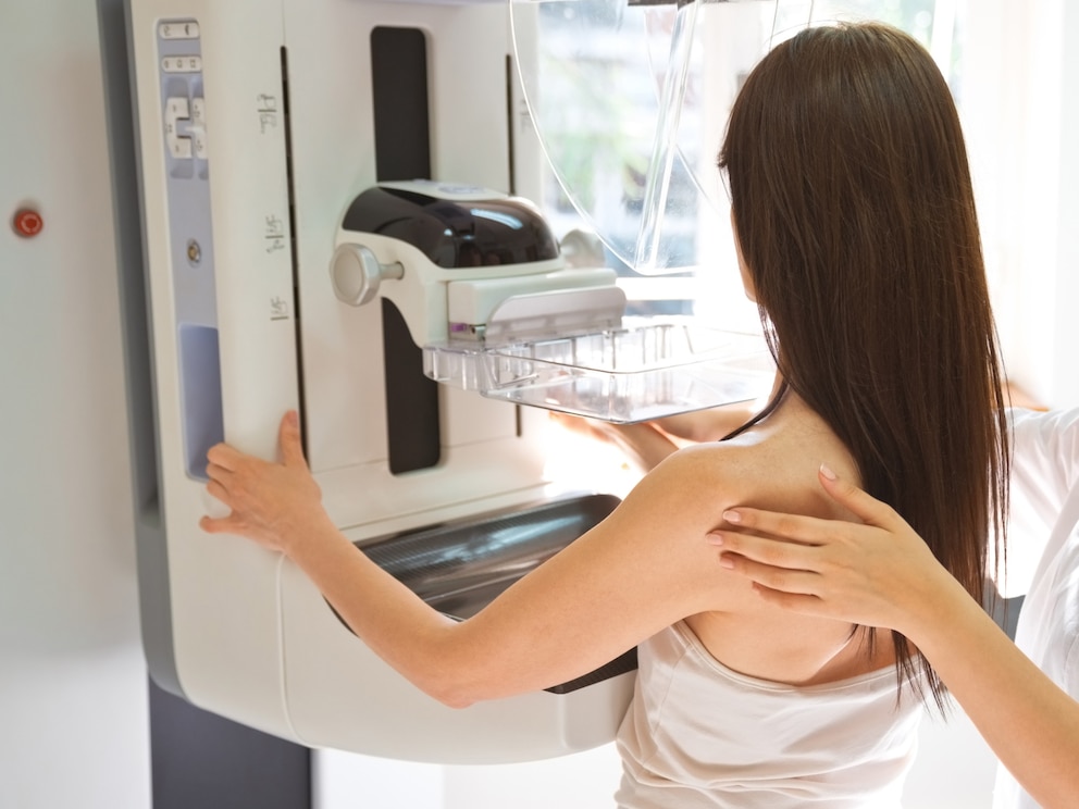PHOTO: In this undated stock photo, a doctor performs a mammogram on a patient.