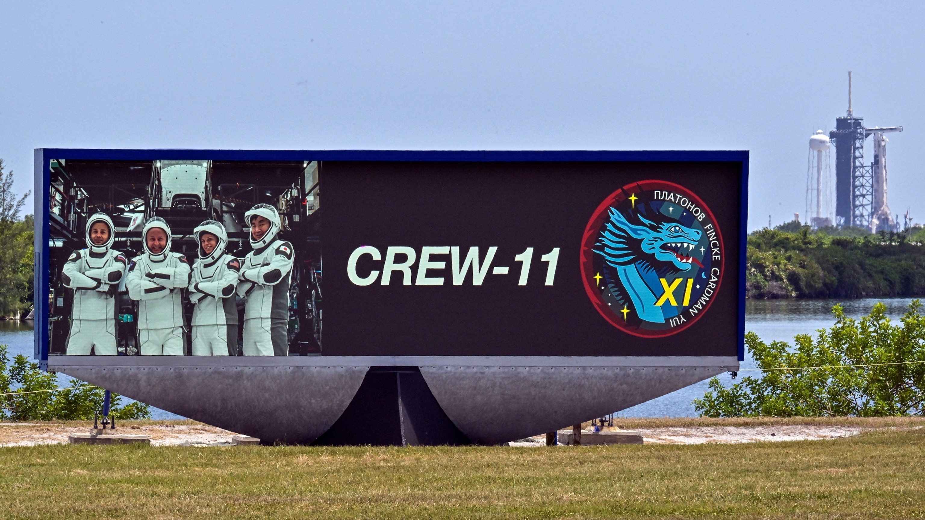 PHOTO: A Falcon 9 rocket stands behind the countdown clock displaying a photo of NASA's SpaceX Crew-11 crew members, in Cape Canaveral, Fla., July 29, 2025.