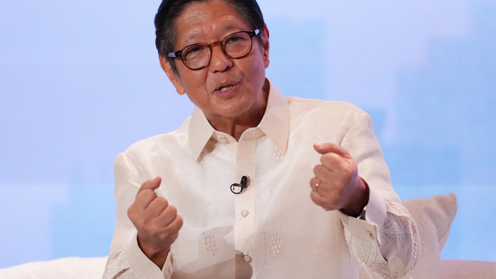 Philippine President Marcos debunks health rumors with jumping jacks