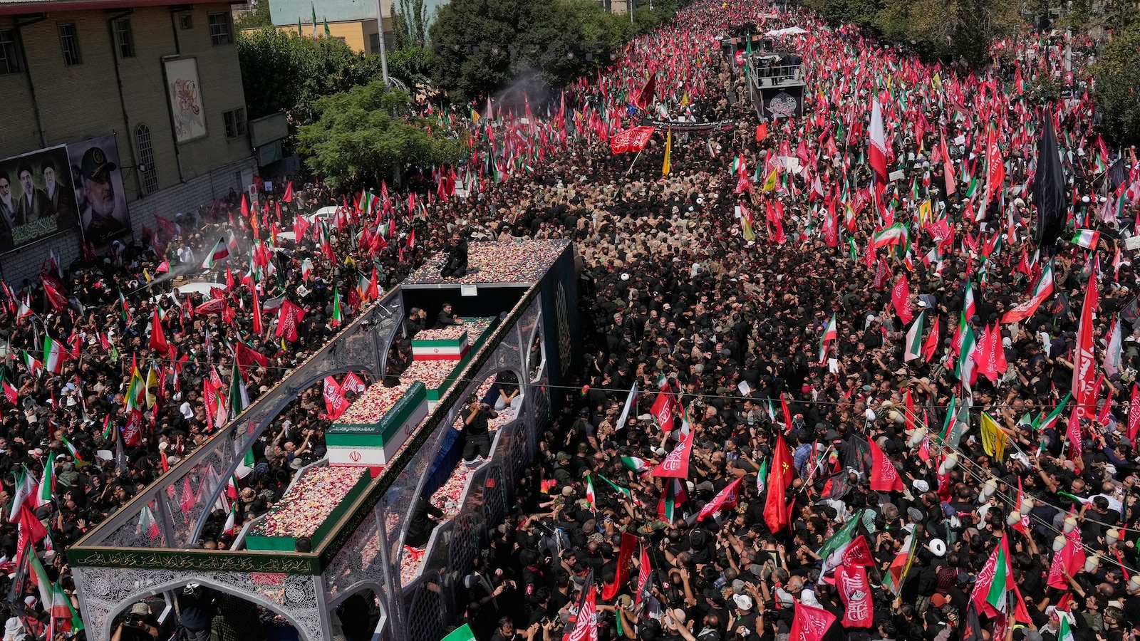Iran live updates: Thousands throng Tehran streets for Khamenei funeral