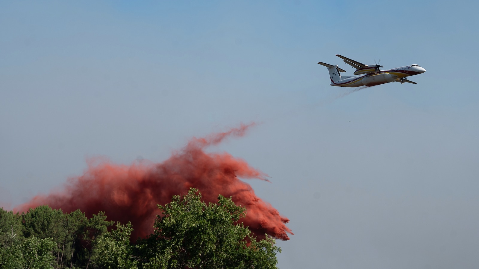 Spain declares an emergency after wildfires force evacuations of 10,000 people