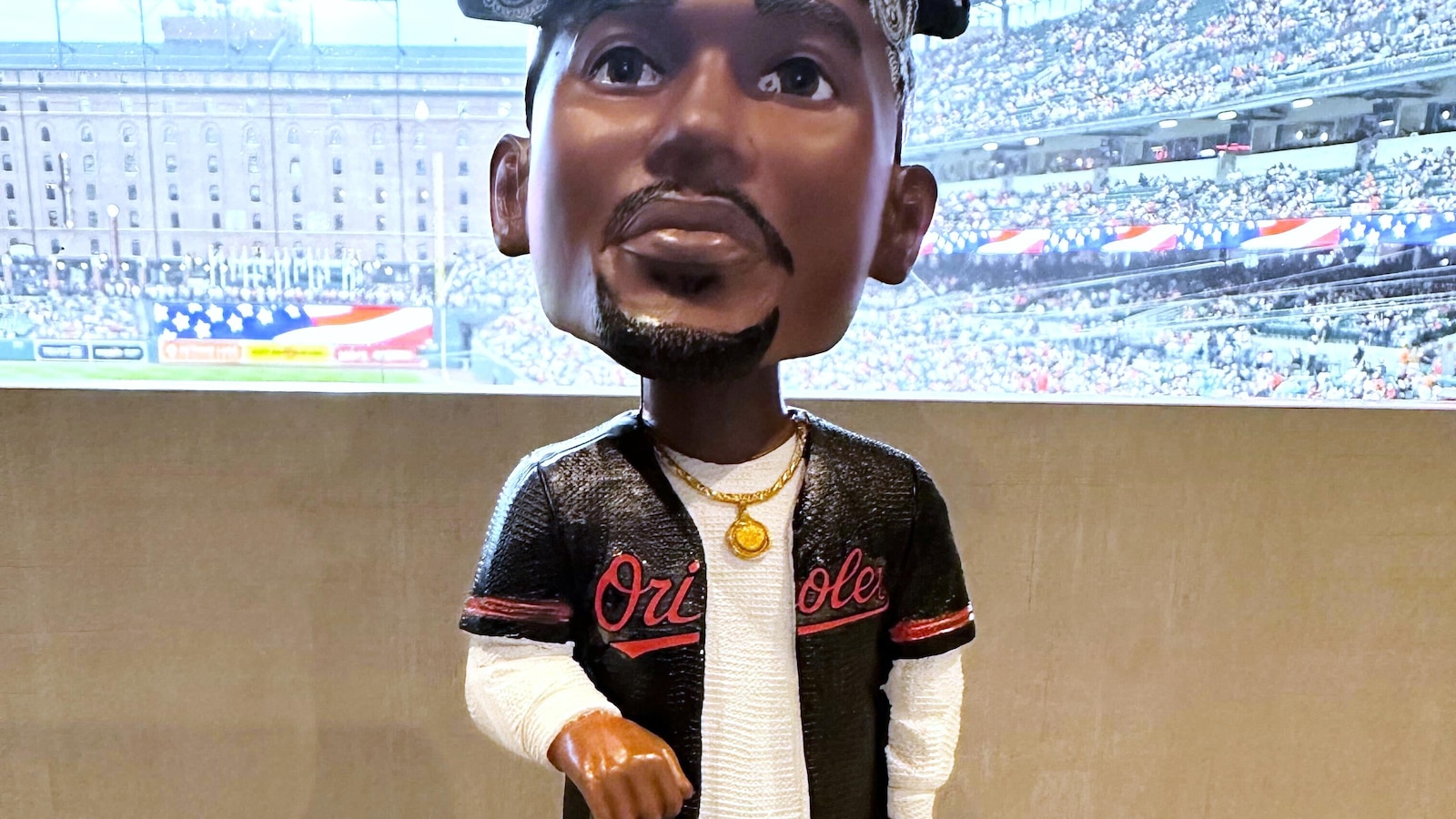 Orioles hold Tupac Skakur bobblehead promotion, and his sister throws out the ceremonial first pitch  abcnews.com