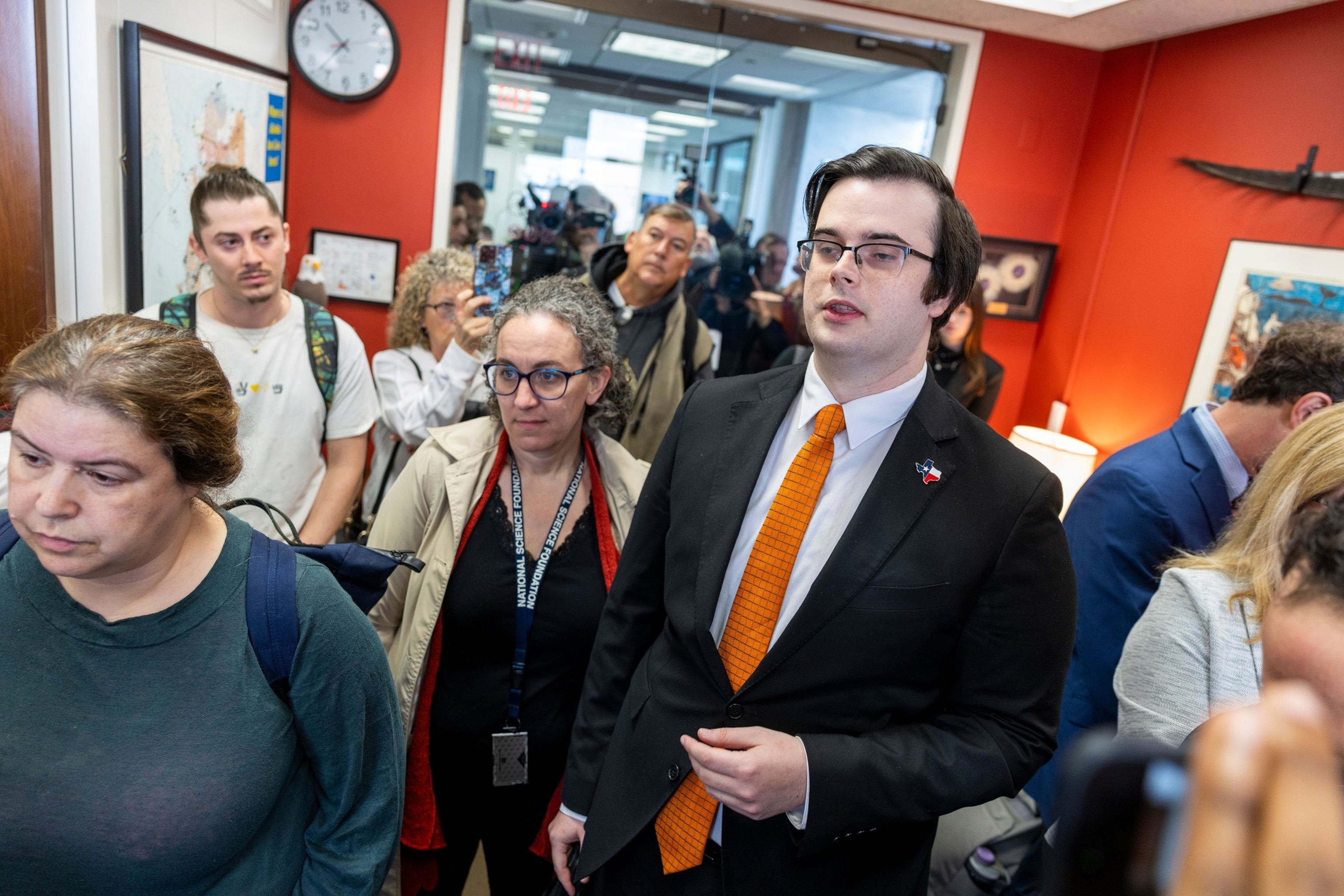 PHOTO: Former National Science Foundation employee Brandon Bradley, who was terminated by the Department of Government Efficiency recites his termination story in Sen. Lisa Murkowski's office in Washington, Feb. 25, 2025.
