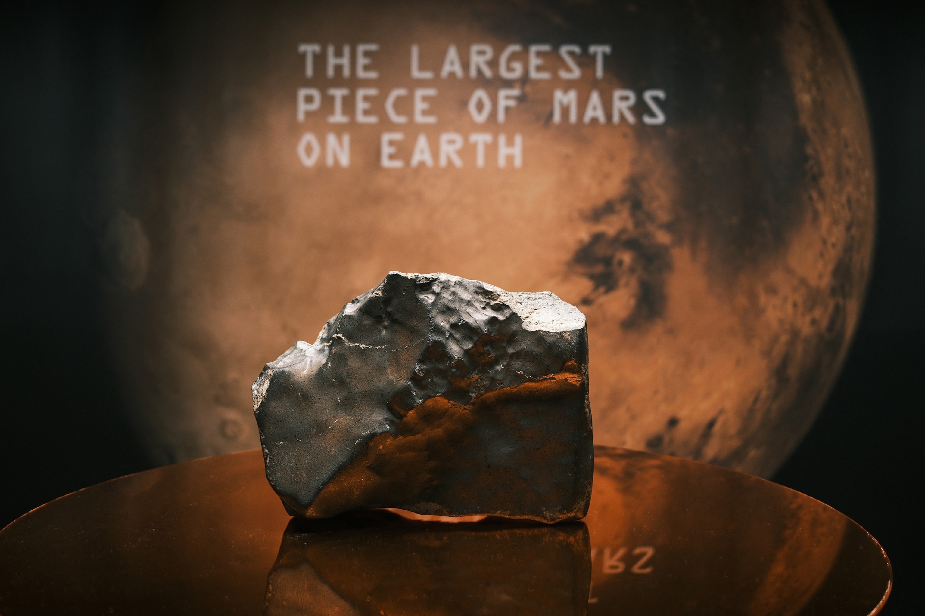 PHOTO: The 54-pound Martian meteorite NWA 16788, the largest known piece of Mars ever discovered on Earth, is displayed during a Sotheby's auction preview in New York, on July 15, 2025.