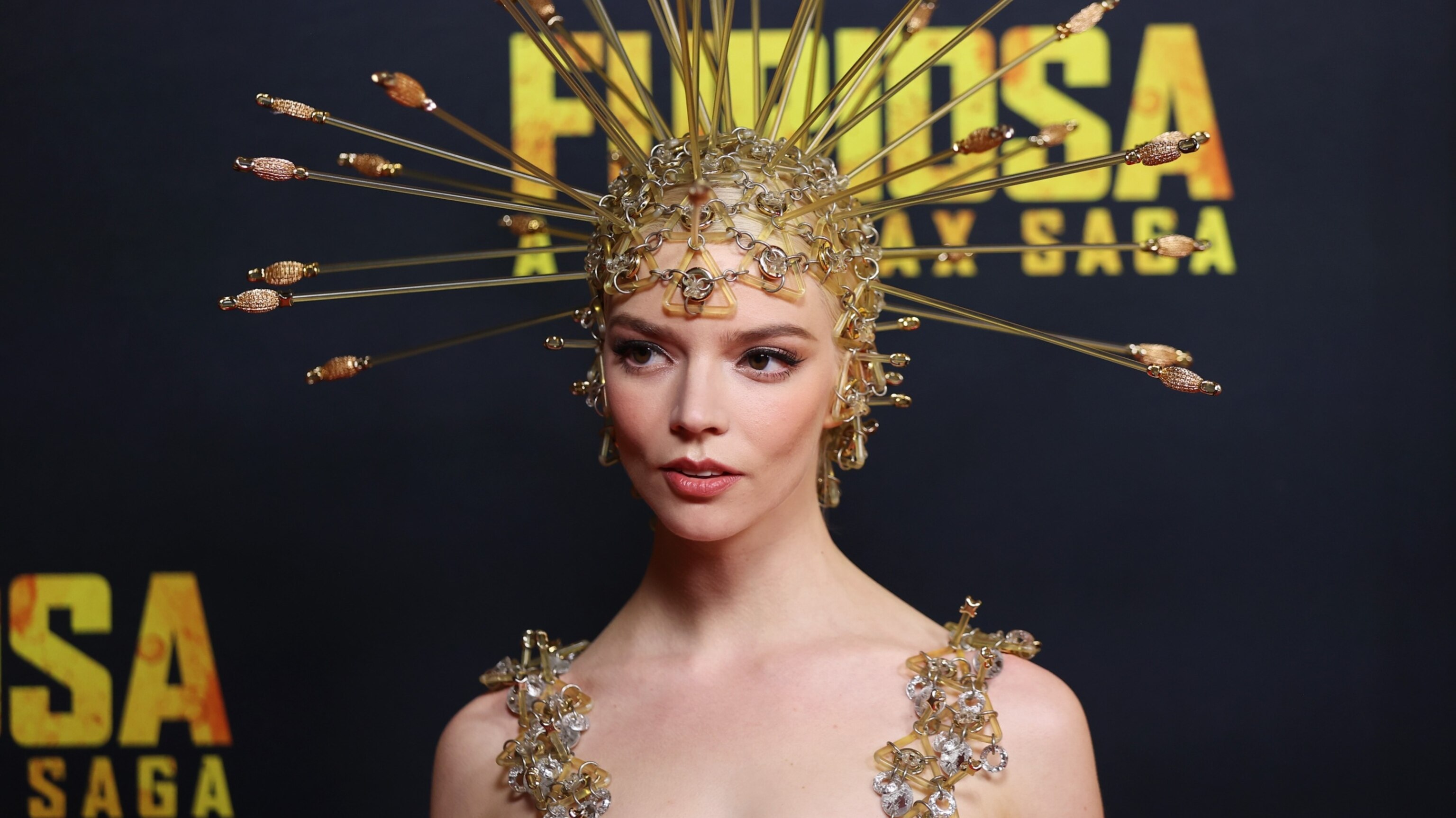 Anya Taylor-Joy strikes gold in dart-filled ensemble for 'Furiosa
