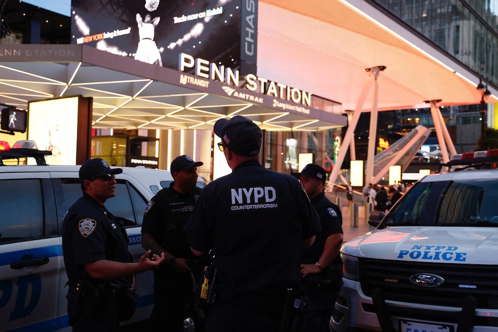 PHOTO: NYPD police officers are seen outside Penn Station in New York on June 7, 2026.