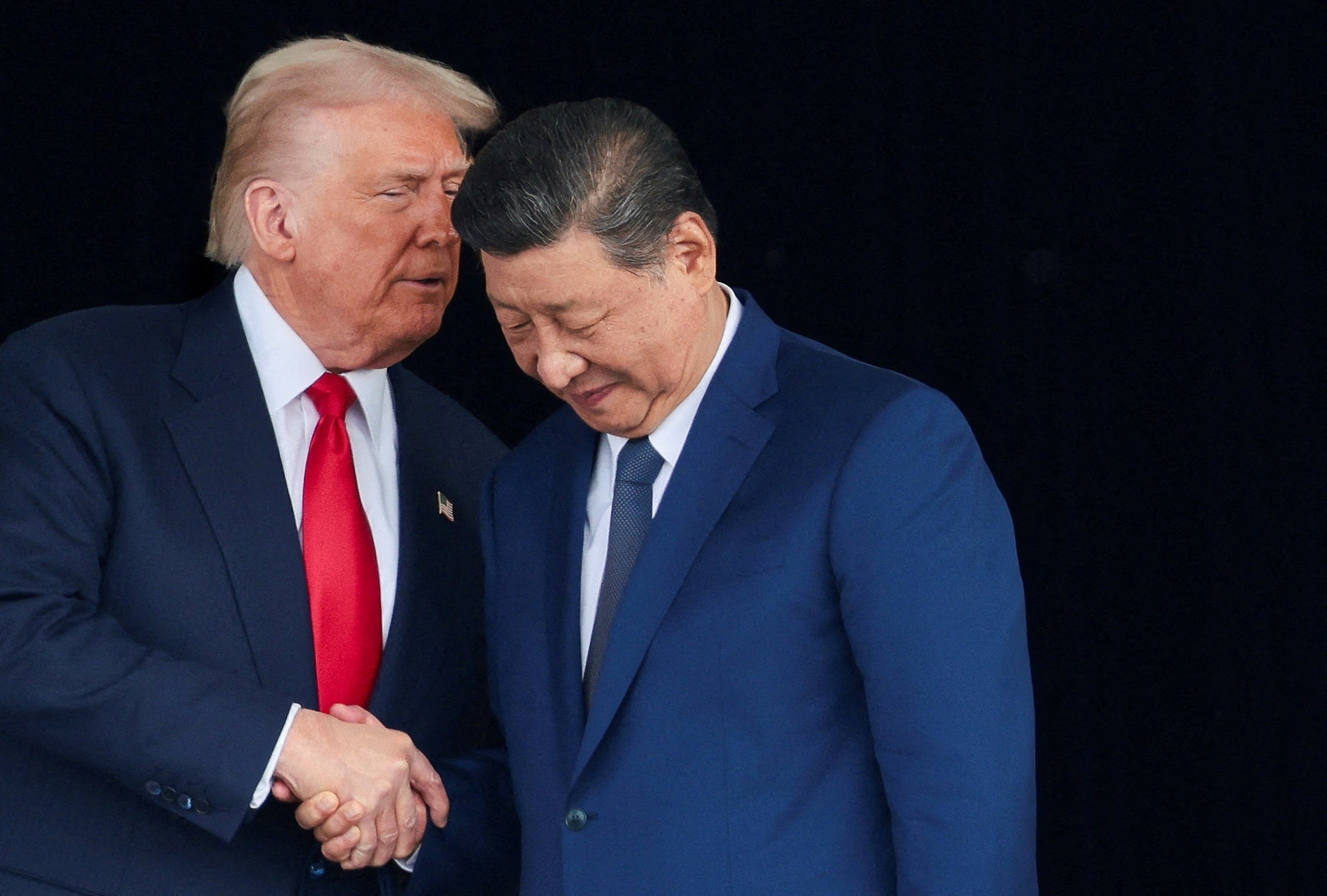 PHOTO: U.S. President Donald Trump meets with Chinese President Xi Jinping on the sidelines of the APEC summit, in Busan