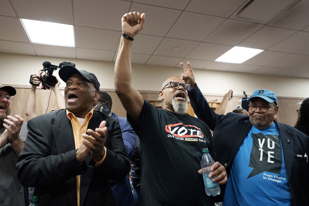 PHOTO: Mike McCallahan and others protest in front of the hearing room, during a public hearing on redistricting as Louisiana Republicans pursue a new congressional voting map, in Baton Rouge, Louisiana, May 8, 2026.