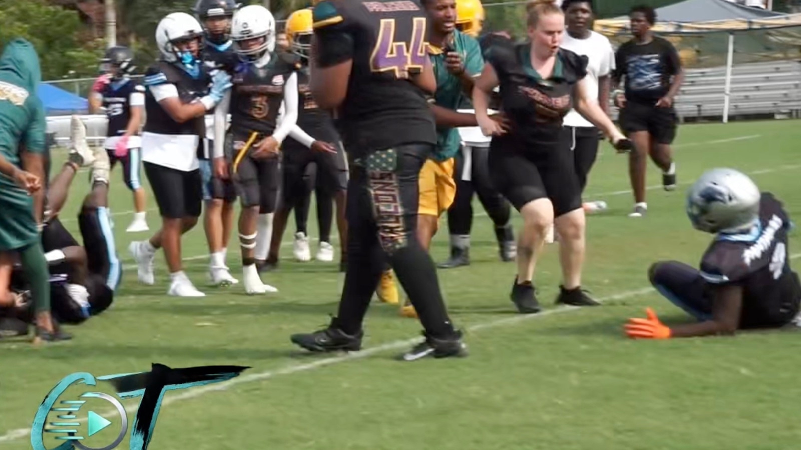 Florida woman arrested for allegedly kicking child during football game