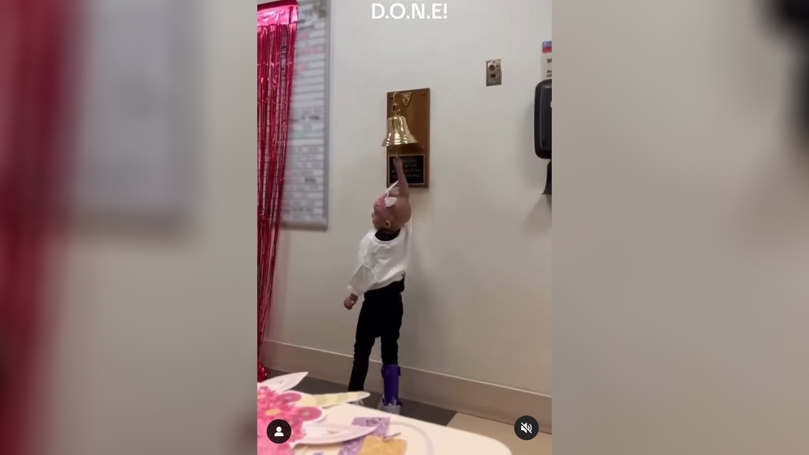 4-year-old girl walks down pink carpet to ring bell at end of cancer treatment