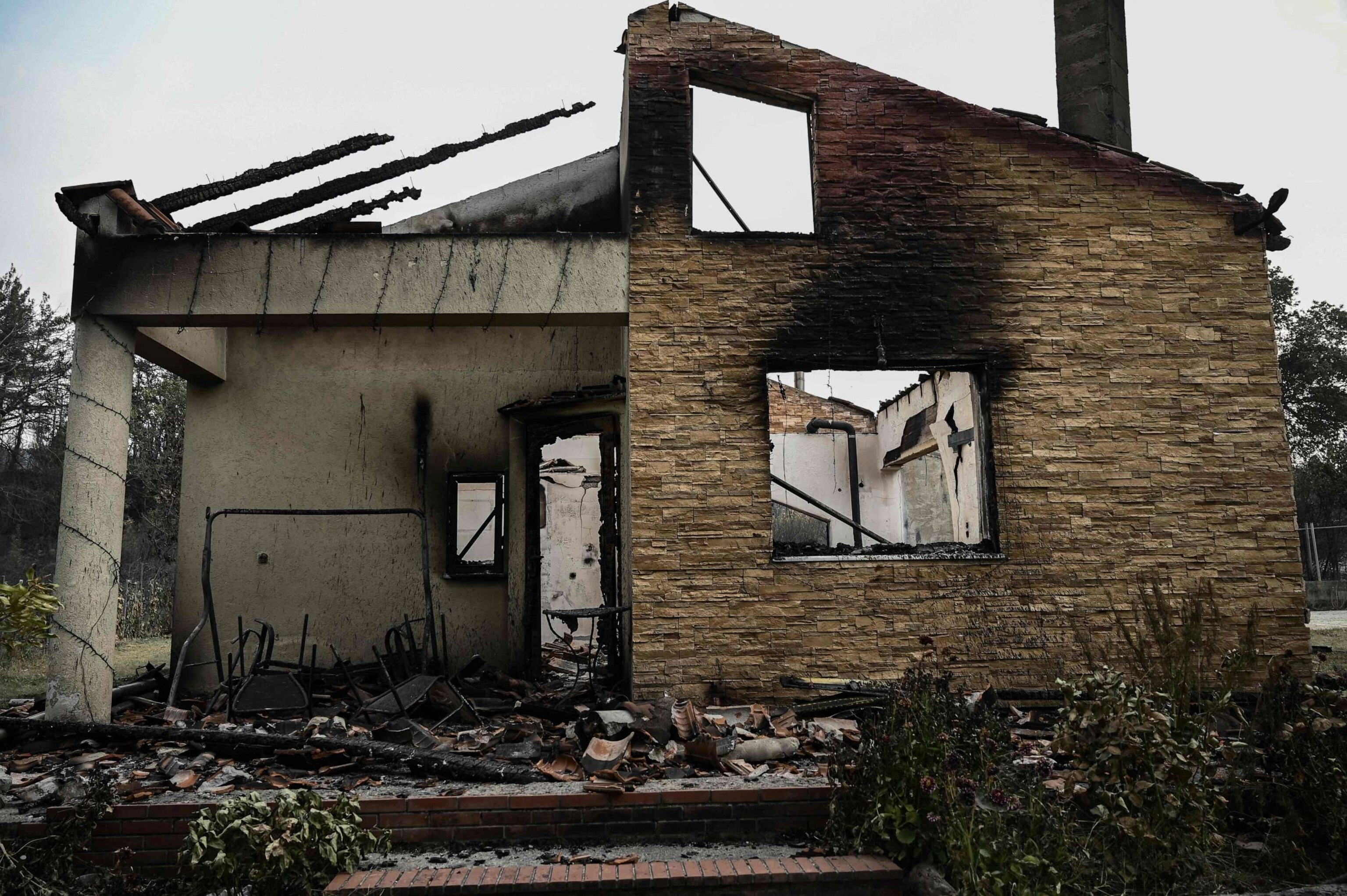 PHOTO: The remains of a house destroyed by wildfire is seen in Kirki village, near Alexandroupolis, northeaster Greece, on Aug. 24, 2023.