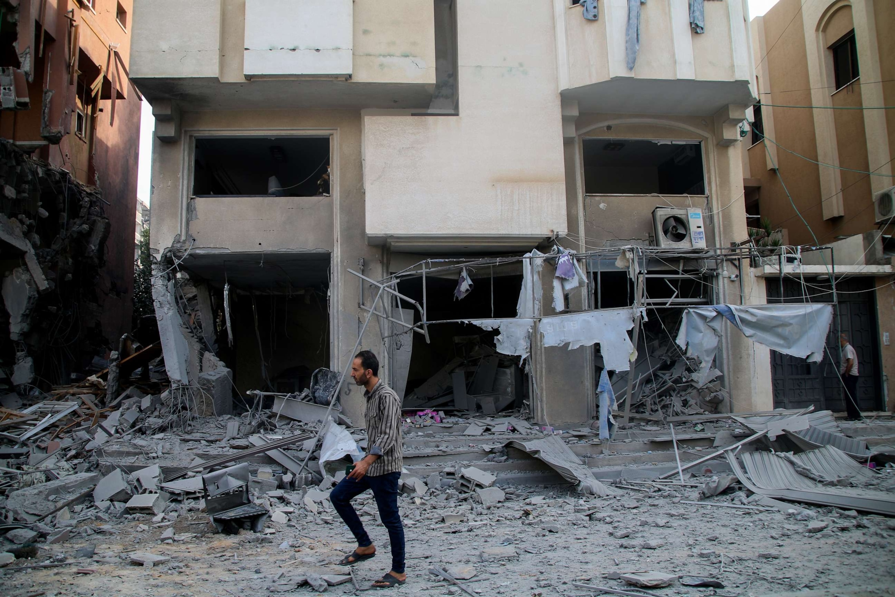 PHOTO: Palestinian citizens inspect damage to their homes caused by Israeli airstrikes in the Karama area, northern Gaza Strip Oct. 11, 2023.