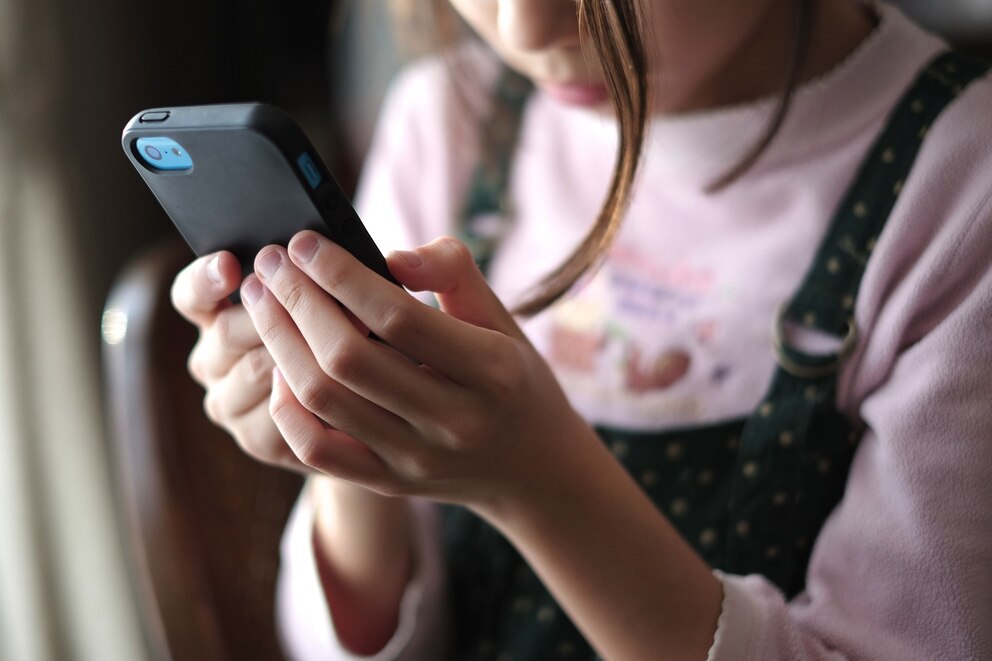 PHOTO: A child uses a smartphone in this stock photo.