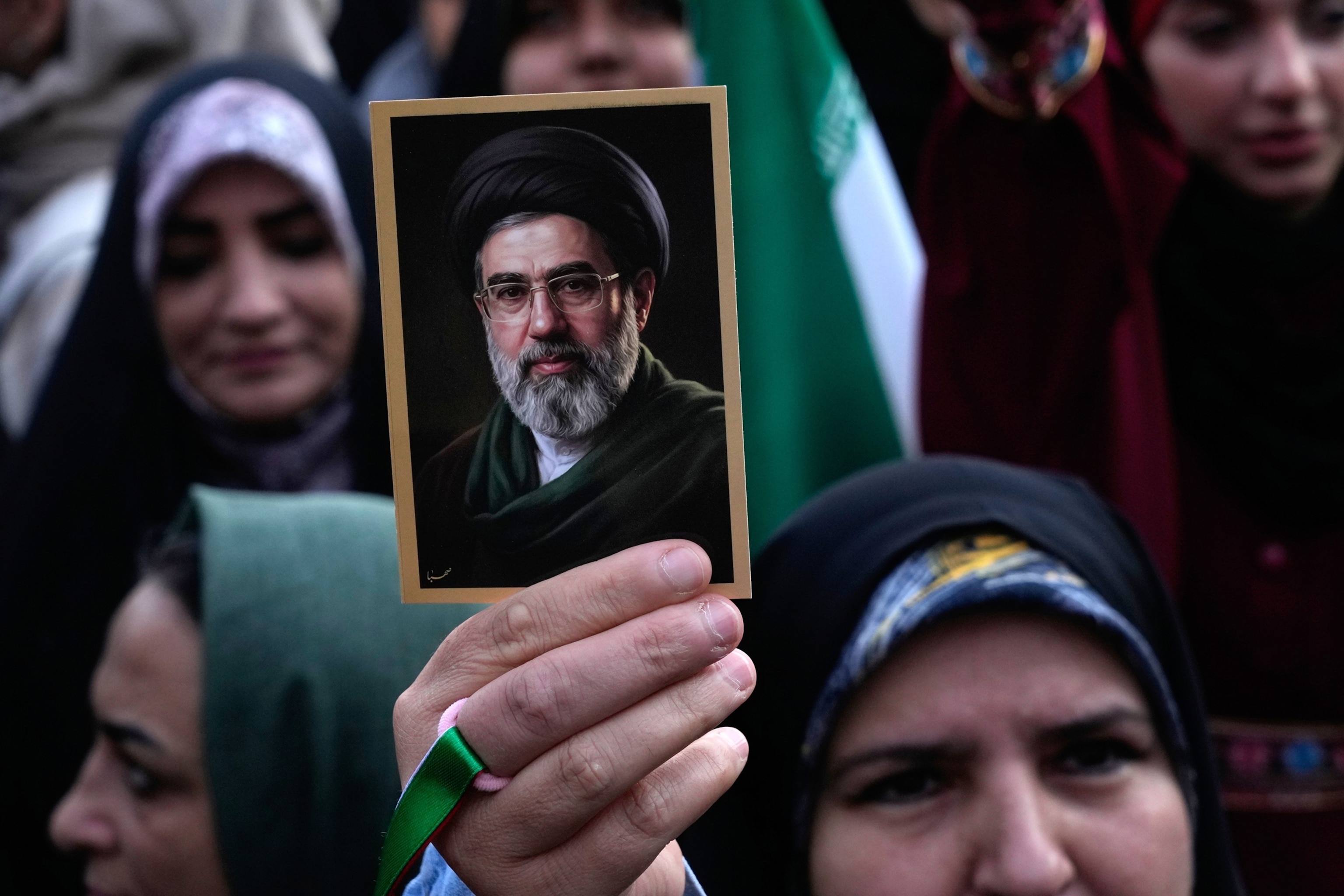 PHOTO: A woman holds up a picture of the Iranian Supreme Leader Ayatollah Mojtaba Khamenei during a state-organised rally celebrating the birthday of Imam Reza, the 8th Shiite Muslims' Imam in Tehran, Iran, April 29, 2026. 