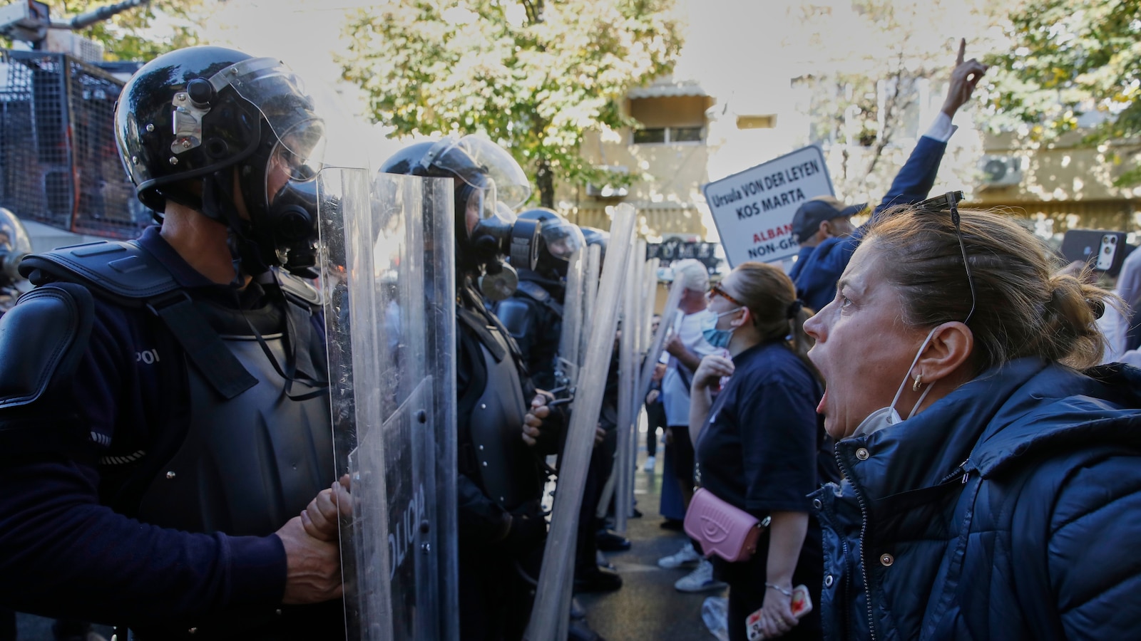 Albanian police clash with anti-government protesters for an 8th day