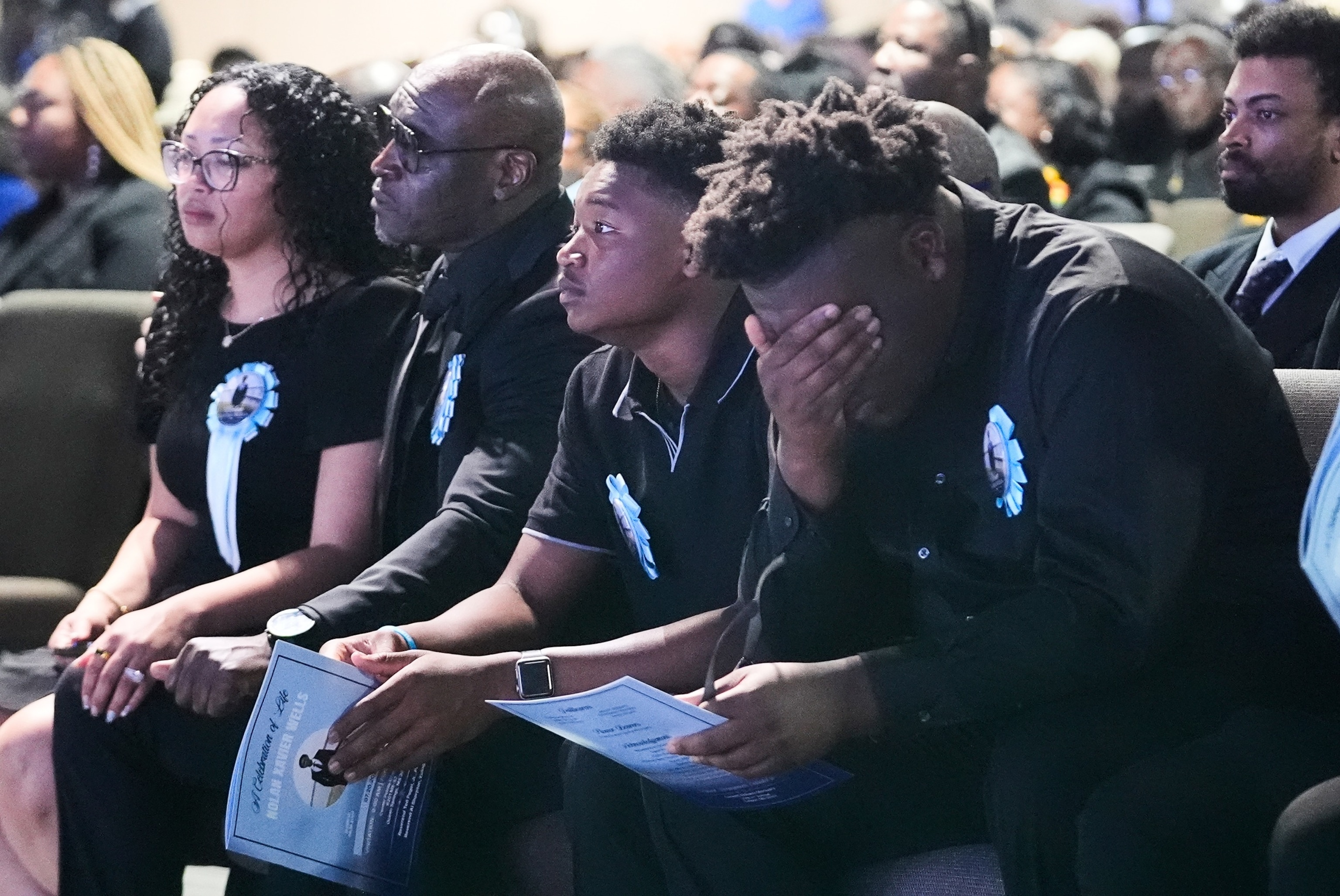 PHOTO: The Wonsley family, from left to right, Christine, her Husband Elmore, sons Elmore Jr. and Ethan attend a memorial service Nolan Xavier Wells, July 20, 2026, in Ocean Springs, Miss.