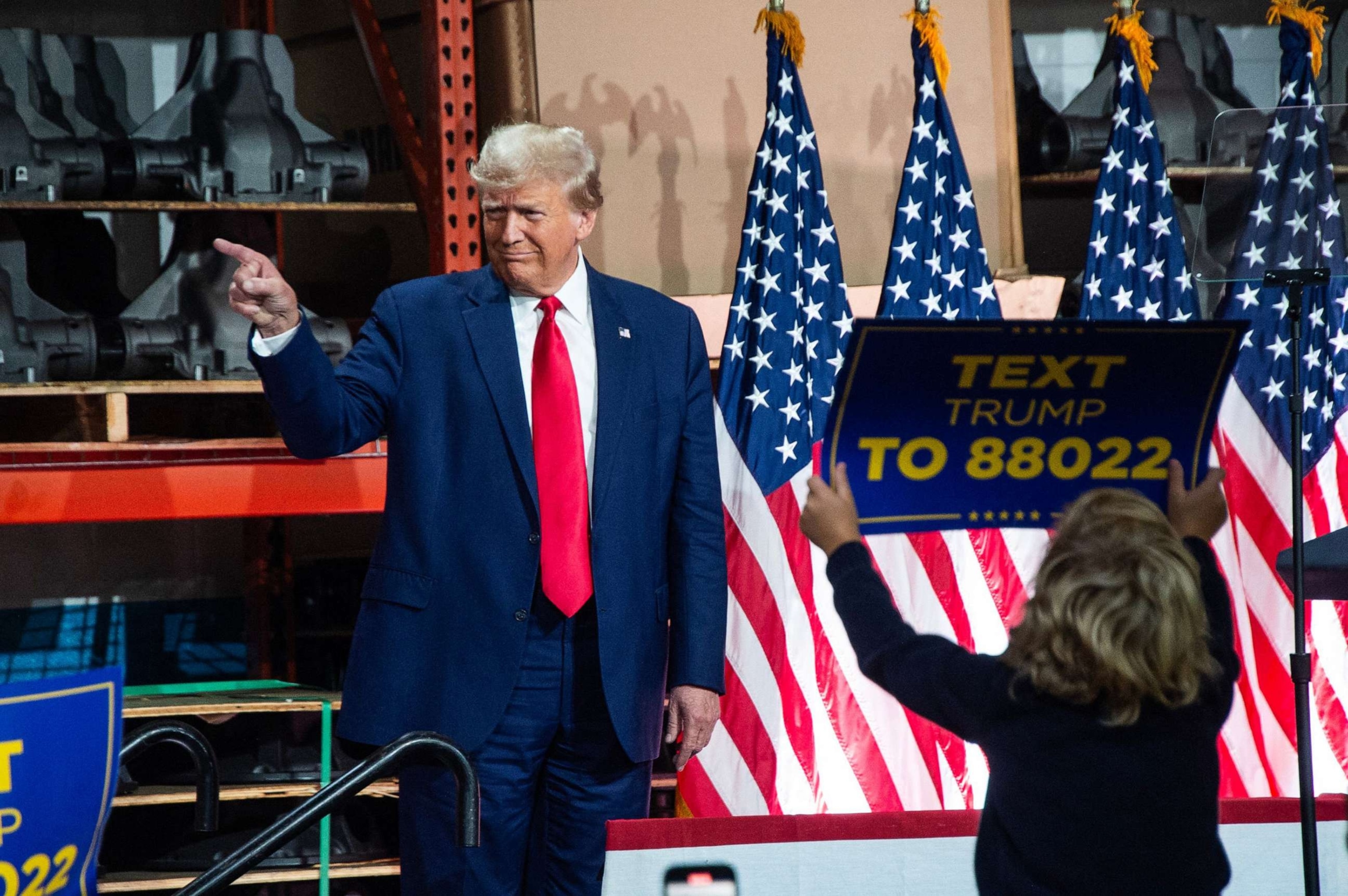 PHOTO: Former President and 2024 presidential hopeful Donald Trump arrives to speak at Drake Enterprises, an automotive parts manufacturer and supplier, in Clinton, Michigan, on Sept. 27, 2023.