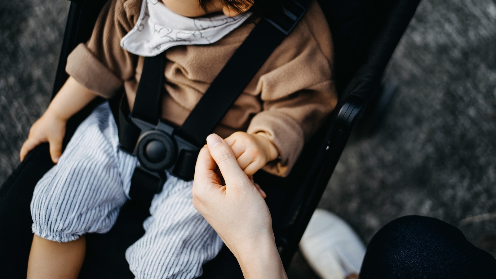 A child is seen in a stroller in this undated stock photo.